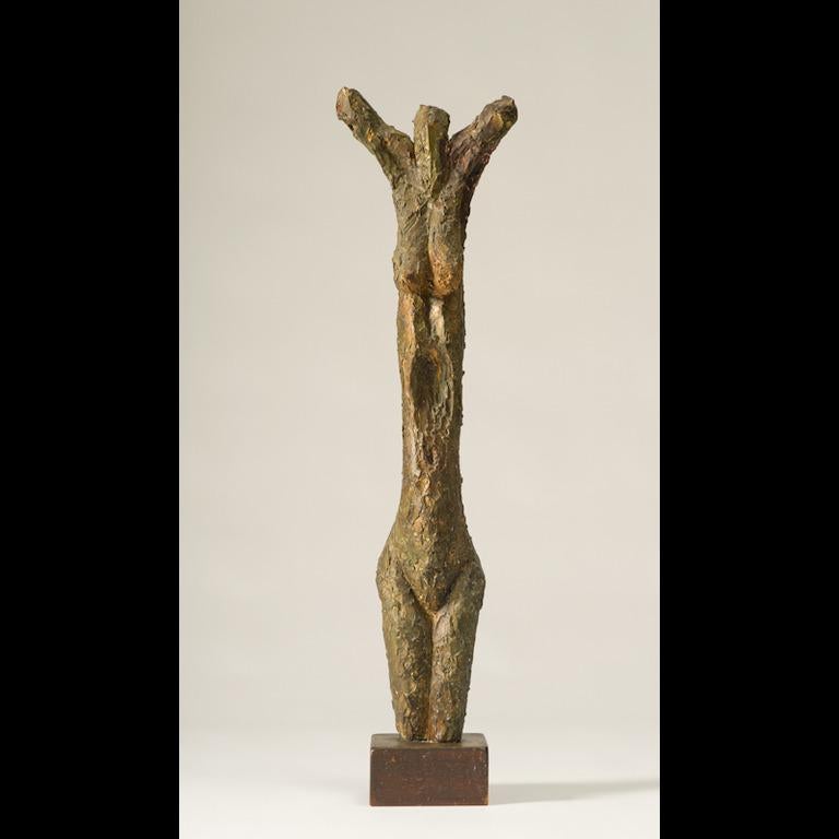 Torso 1955 is a cast plaster with oil paint to resemble a bronze cast. The base is wood, carved, sanded and painted. The base shows slight wear on corners. The sculpture is perfect. The bottom of the wood base has Hostetler's signature as Dave