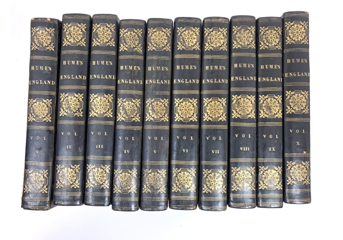 London Stereotype Edition. Complete 16 vol. edition 1824. Black and gilt embossed leatherbound with marbled end papers and edges. 
The set comprised of 10 volumes with Humes on spine and 6 volumes with Smollett on spine. Those volumes are numbered