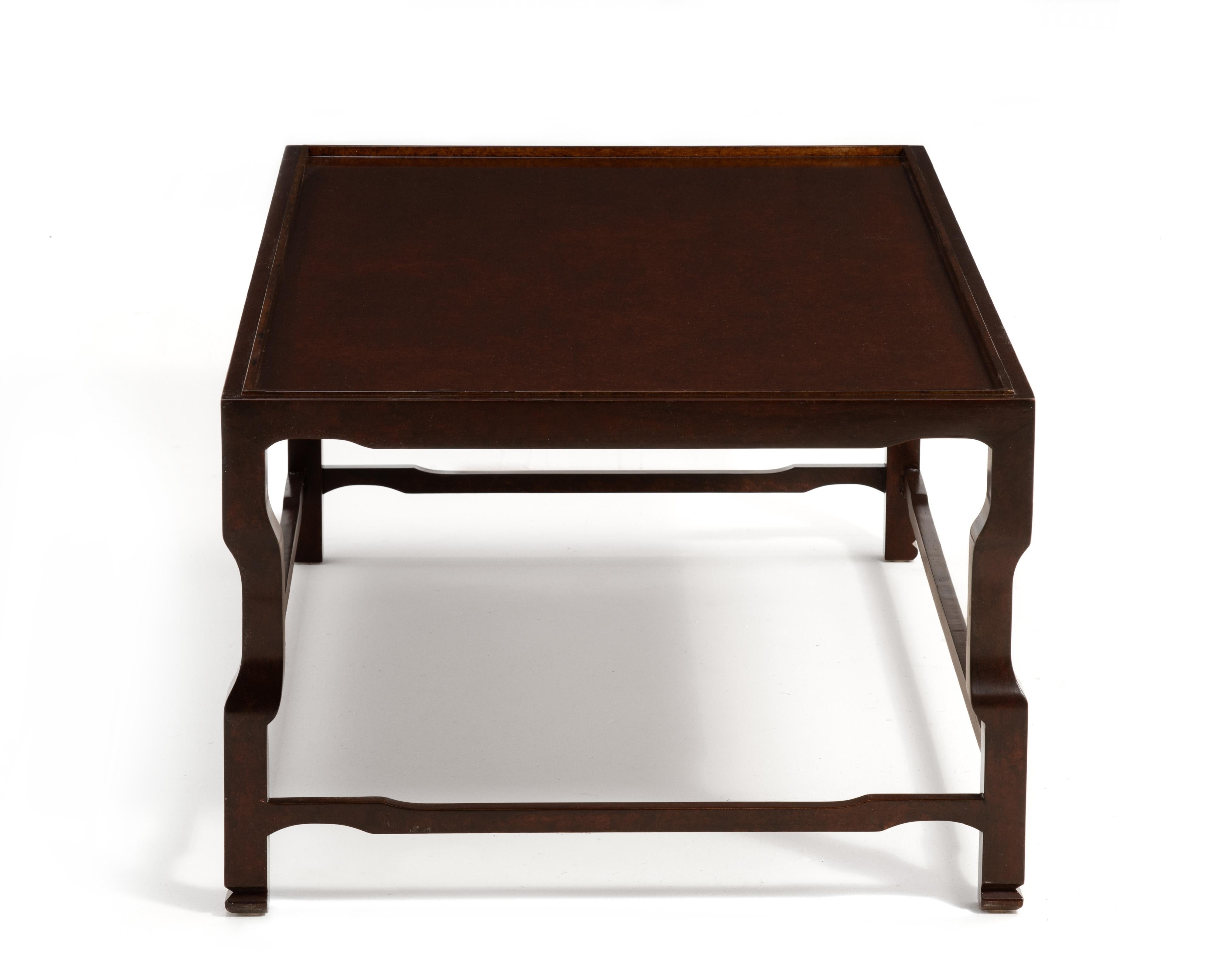 Designed by Frank Babb Randolph, the Shenzhen coffee table is made by David Iatesta Studio in Anapolis, Maryland. Made with cherry wood, the table is light and solid, well made with attention paid to the smallest details. The factory finish is