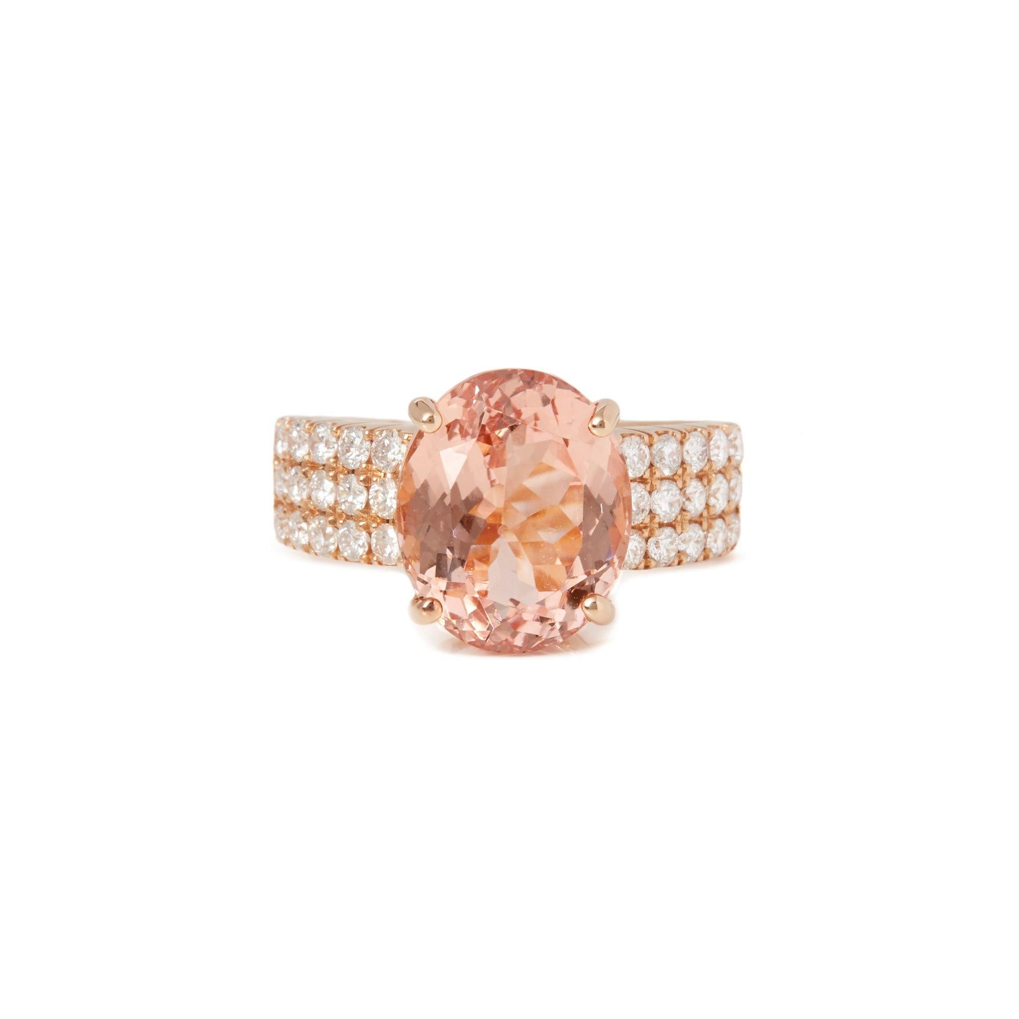 This ring designed by David Jerome is from his private collection and features one oval cut Morganite totalling 5.46cts sourced in Brazil. Set with round brilliant cut diamonds totalling 0.75cts mounted in an 18k rose gold setting. Finger size UK N,