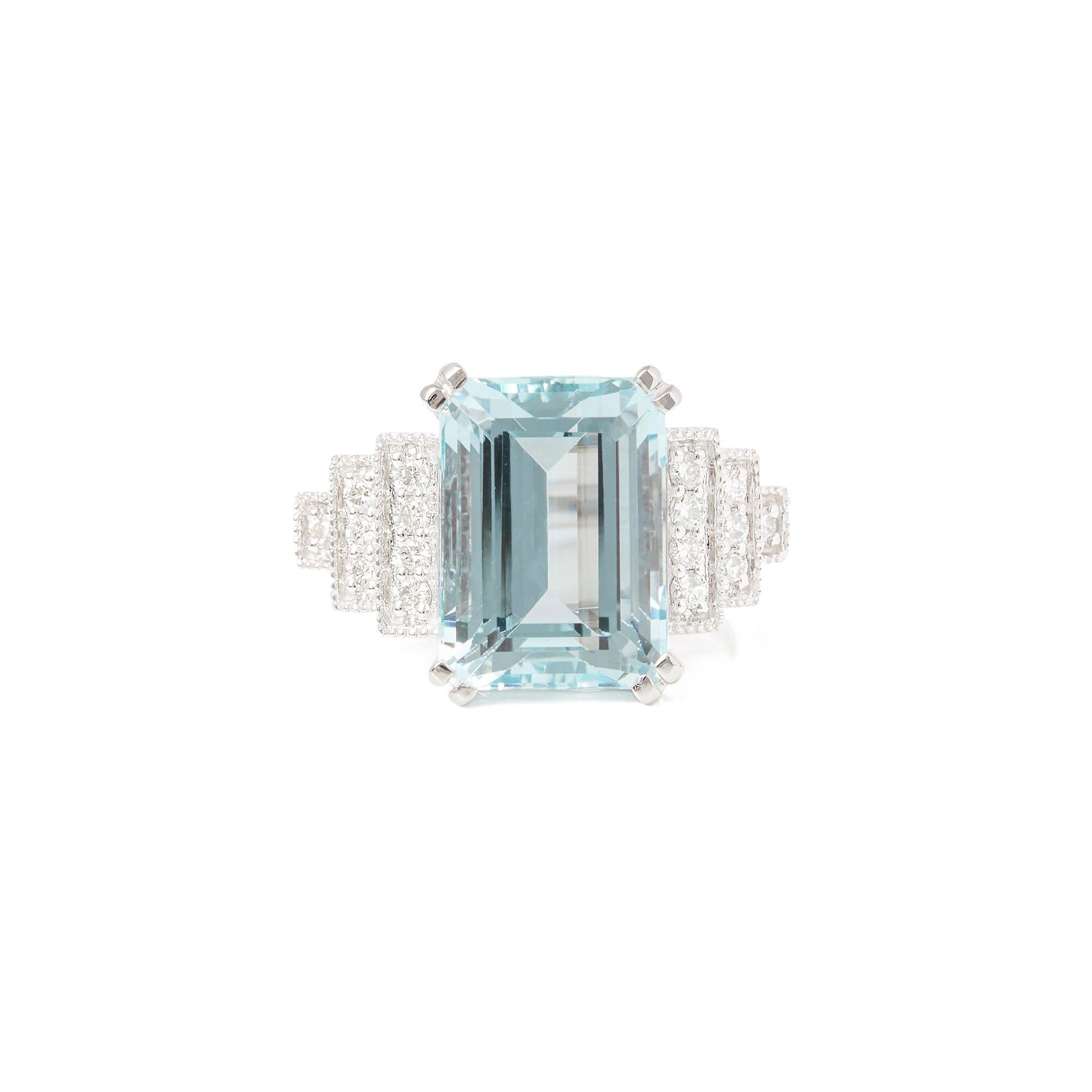 This ring designed by David Jerome is from his private collection and features one Emerald cut Aquamarine totalling 6.63cts sourced in Brazil. Set with round brilliant cut Diamonds totalling 0.24cts. Mounted in an 18k white gold setting. Finger size