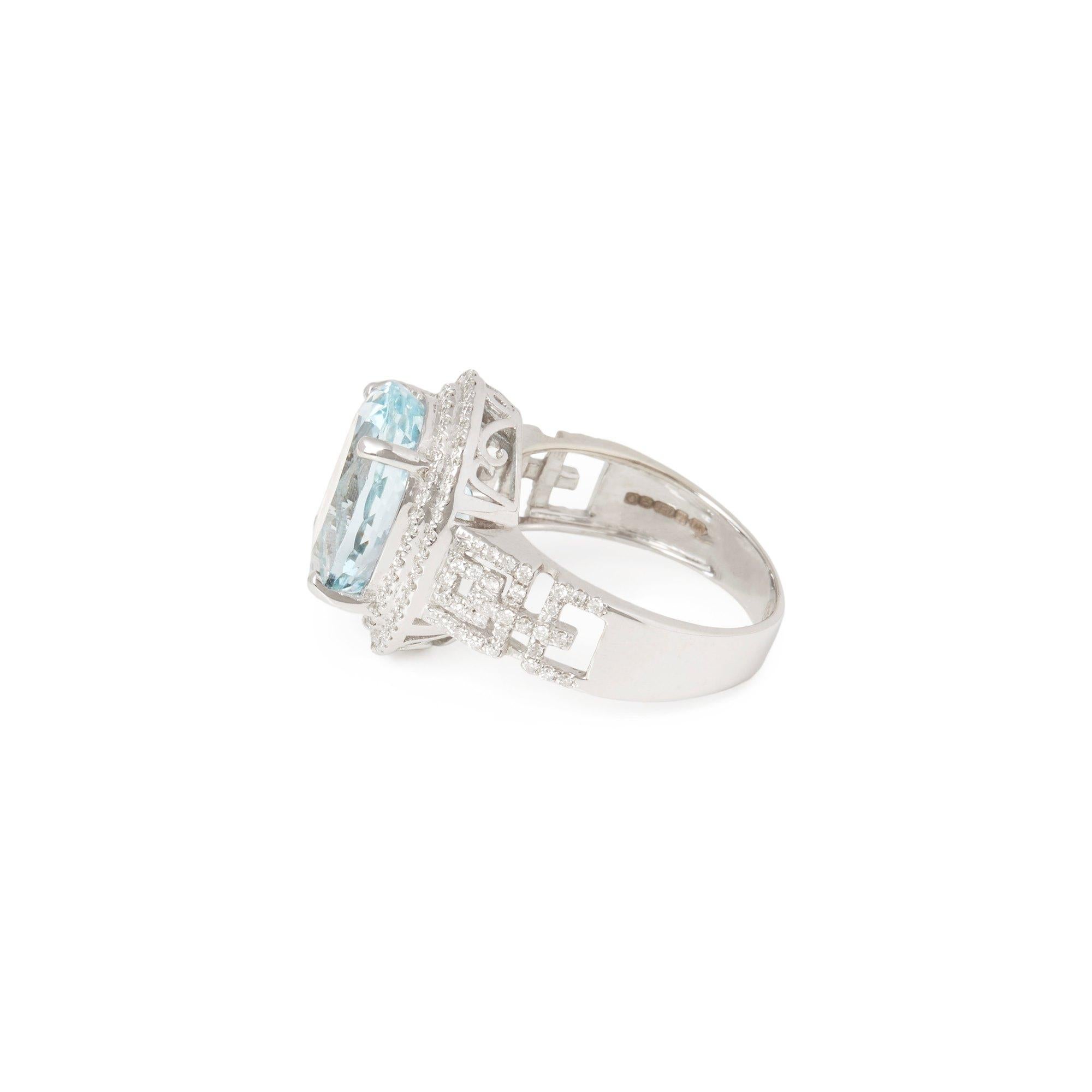 Contemporary Certified 6.82ct Brazilian Oval Cut Aquamarine and Diamond 18ct gold Ring For Sale