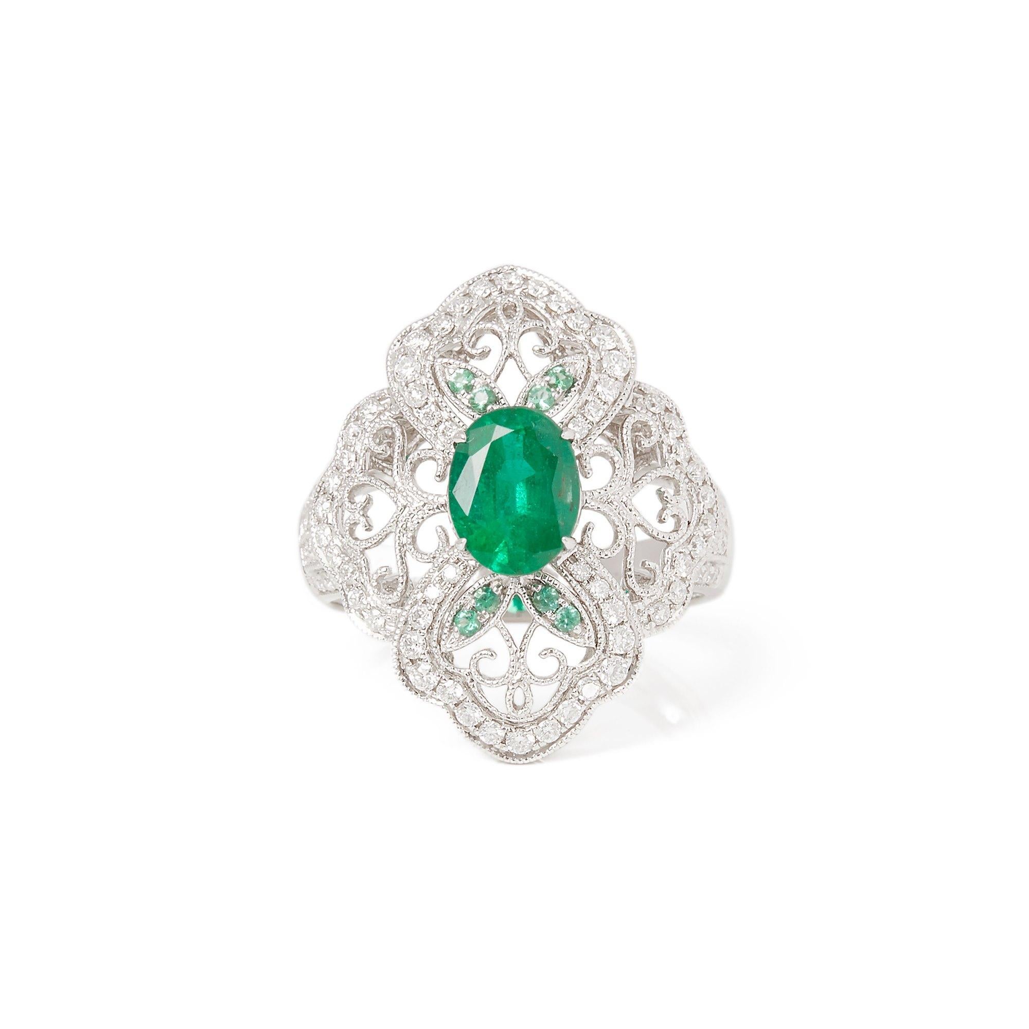 This ring designed by David Jerome is from his private collection and features one oval Cut Emerald totalling 1.72cts sourced from the chivor mine in Columbia. Set with round brilliant cut Diamonds totalling 0.63cts mounted in an 18k white gold