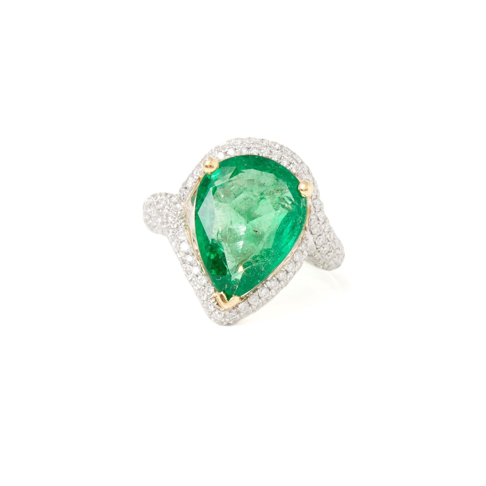 This ring designed by David Jerome is from his private collection and features one pear cut Emerald totalling 7.04cts sourced in the chivor mine in Columbia. Set with round brilliant cut Diamonds totalling 1.10cts mounted in an 18k white gold