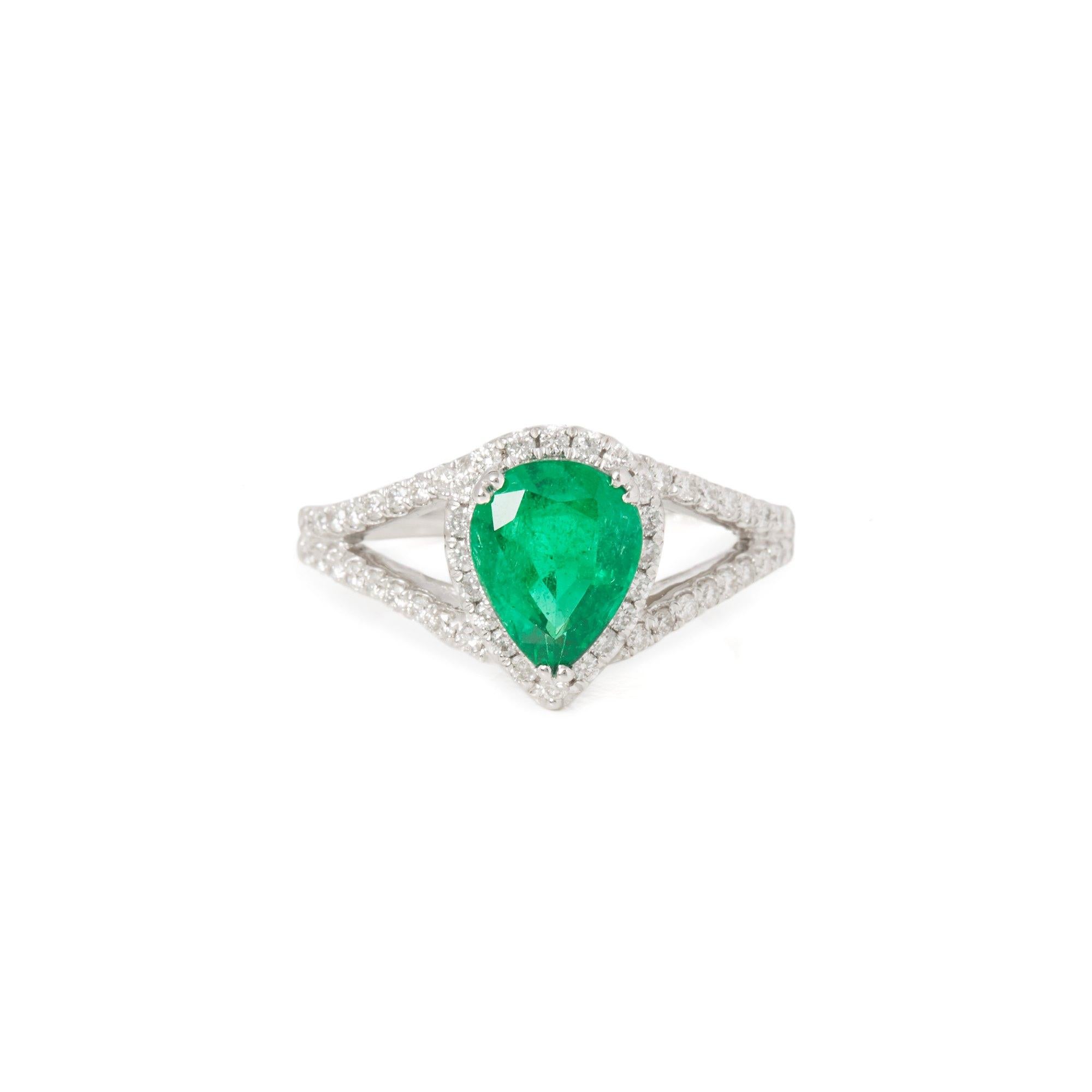 This ring designed by David Jerome is from his private collection and features one pear cut Emerald totalling 1.57cts. Set with round brilliant cut Diamonds totalling 0.71cts mounted in an 18k white gold setting. Finger size UK M, EU size 52, USA