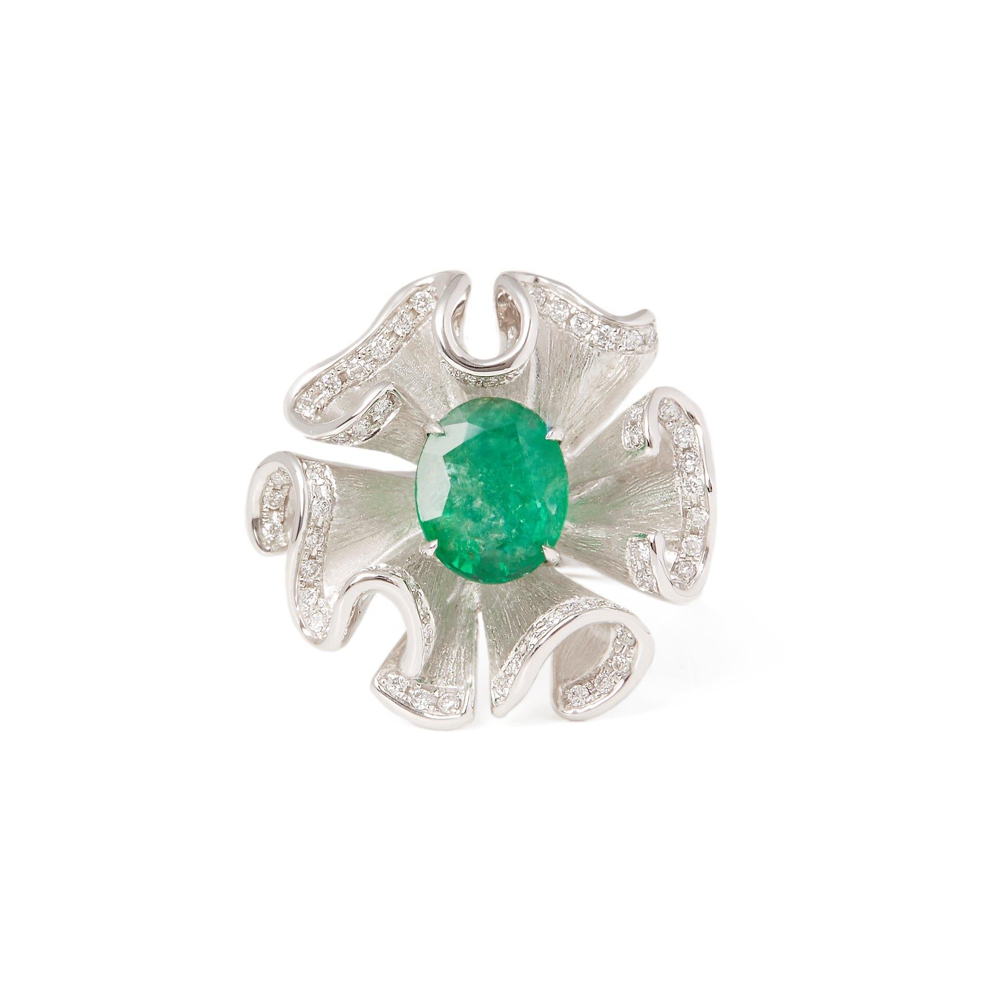 This ring designed by David Jerome is from his private collection and features one oval cut Emerald totalling 1.69cts sourced in Zambia. Set with round brilliant cut Diamonds totalling 0.30cts mounted in an 18k white gold setting. Finger size UK  N,