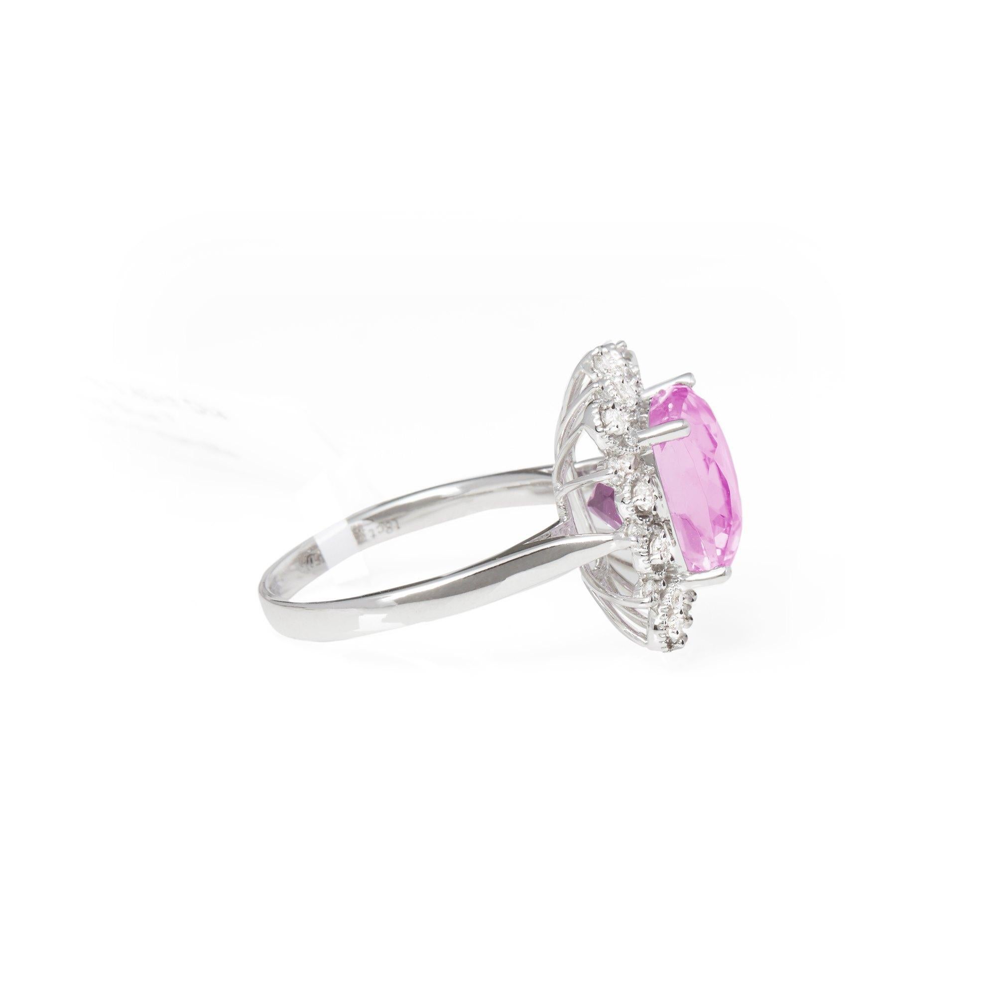 This ring designed by David Jerome is from his private collection and features one cushion cut kunzite totalling 5.91cts sourced in Afghanistan. Set with round brilliant cut Diamonds totalling 0.40cts mounted in an 18k white gold setting. UK finger
