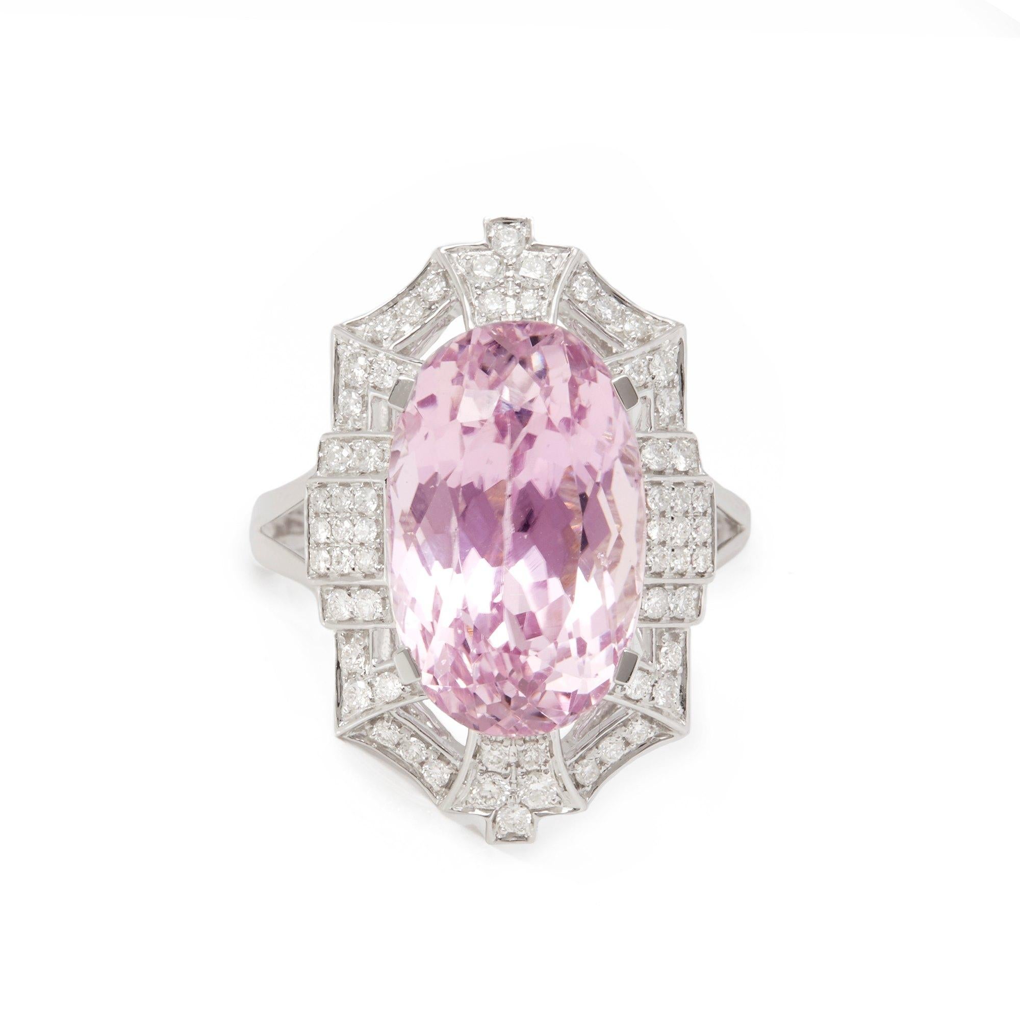 This ring designed by David Jerome is from his private collection and features one natural unheated oval cut kunzite totalling 9.91cts sourced in Afghanistan. Set with round brilliant cut Diamonds totalling 0.41cts mounted in an 18k white gold