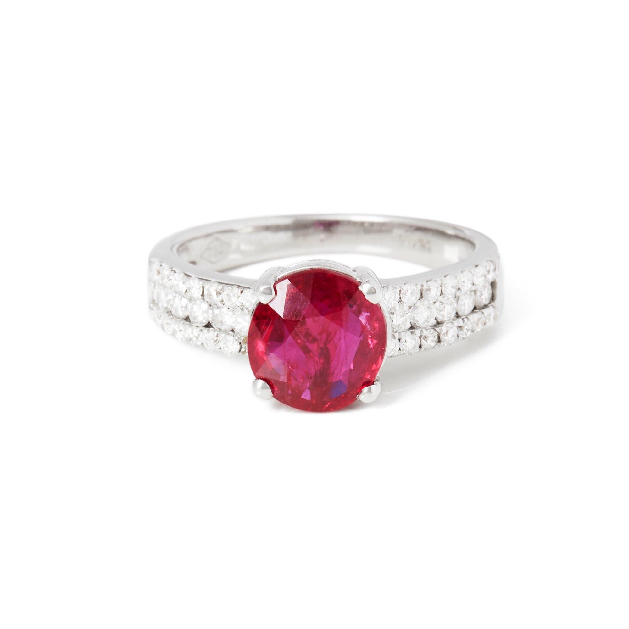 This ring designed by David Jerome is from his private collection and features one oval cut Ruby totalling 2.03cts sourced in Mozambique. Set with round brilliant cut Diamonds totalling 0.44cts mounted in an 18k white gold setting. UK finger size K