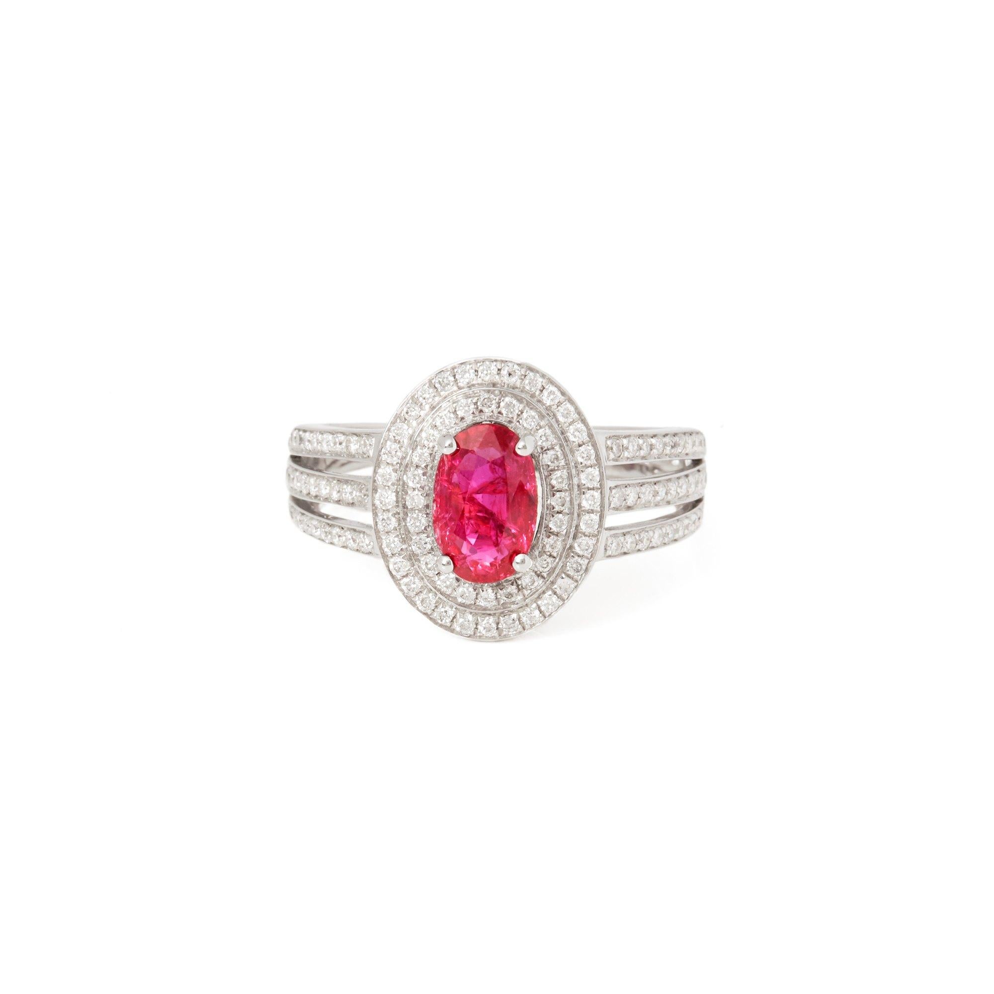 This ring designed by David Jerome is from his private collection and features one natural unheated oval cut Ruby totalling 1.09cts sourced in Burma. Set with round brilliant cut Diamonds totalling 0.48cts mounted in an 18k white gold setting. UK