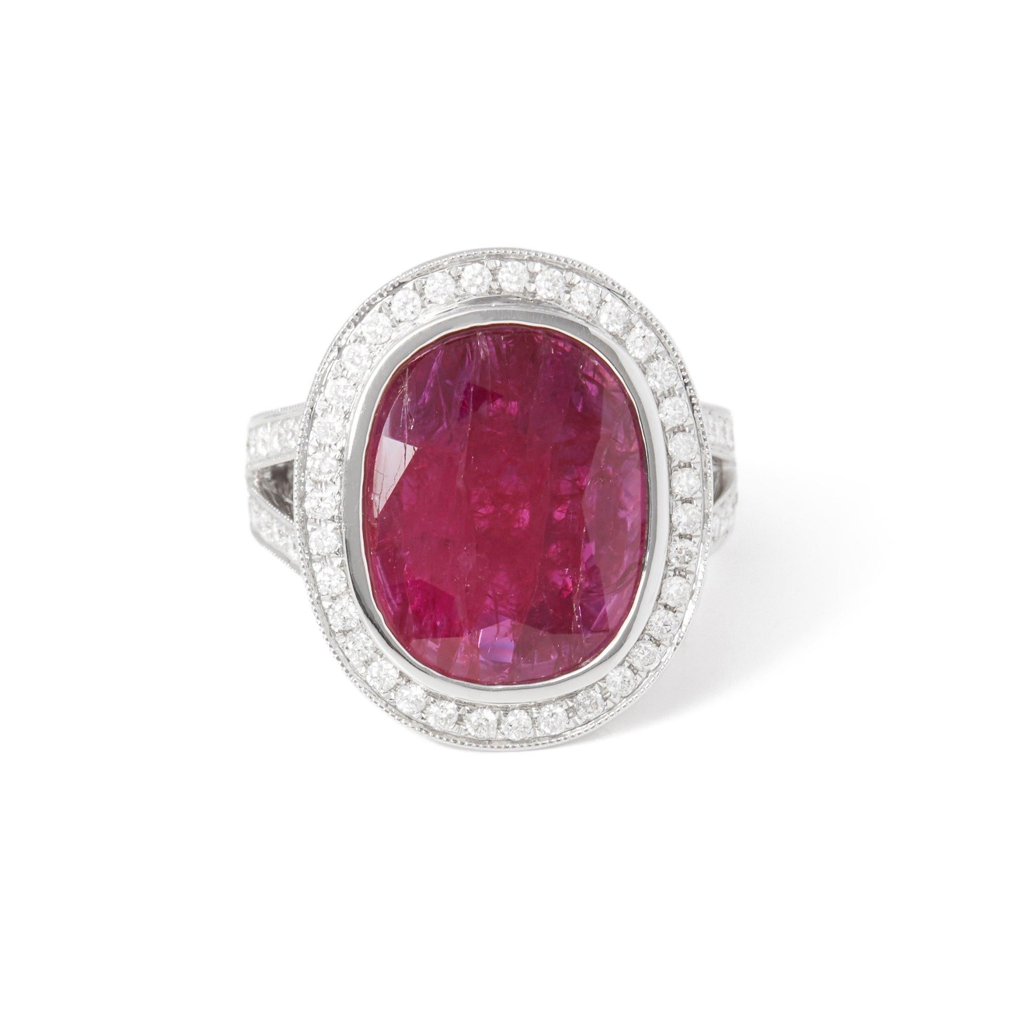 This ring designed by David Jerome is from his private collection and features one oval cut Ruby totalling 7.10cts sourced in Burma. Set with round brilliant cut Diamonds totalling 0.63cts mounted in an 18k white gold setting. Finger size UK M, EU