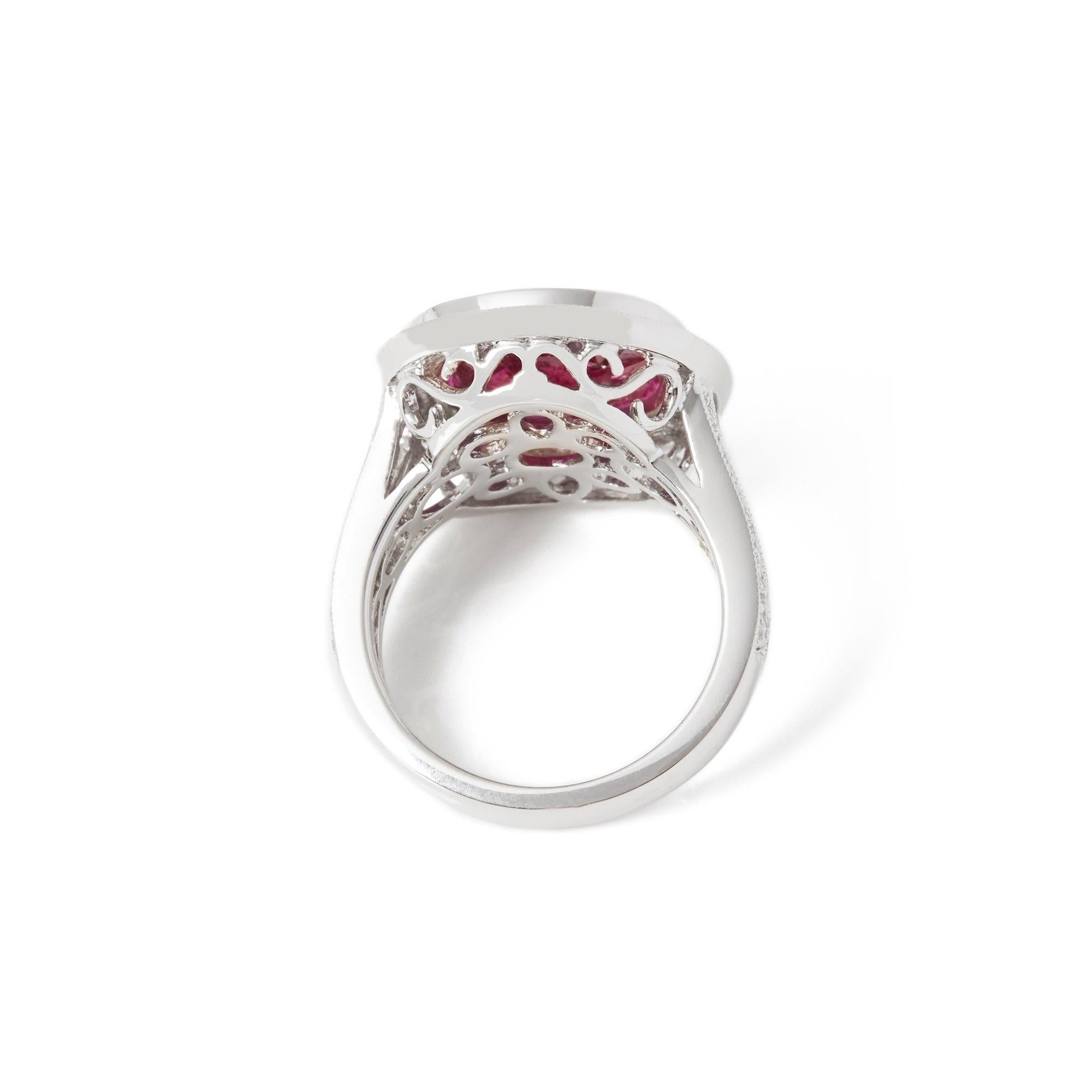 Contemporary Certified 7.1ct Oval Cut Ruby and Diamond 18ct Gold Ring For Sale