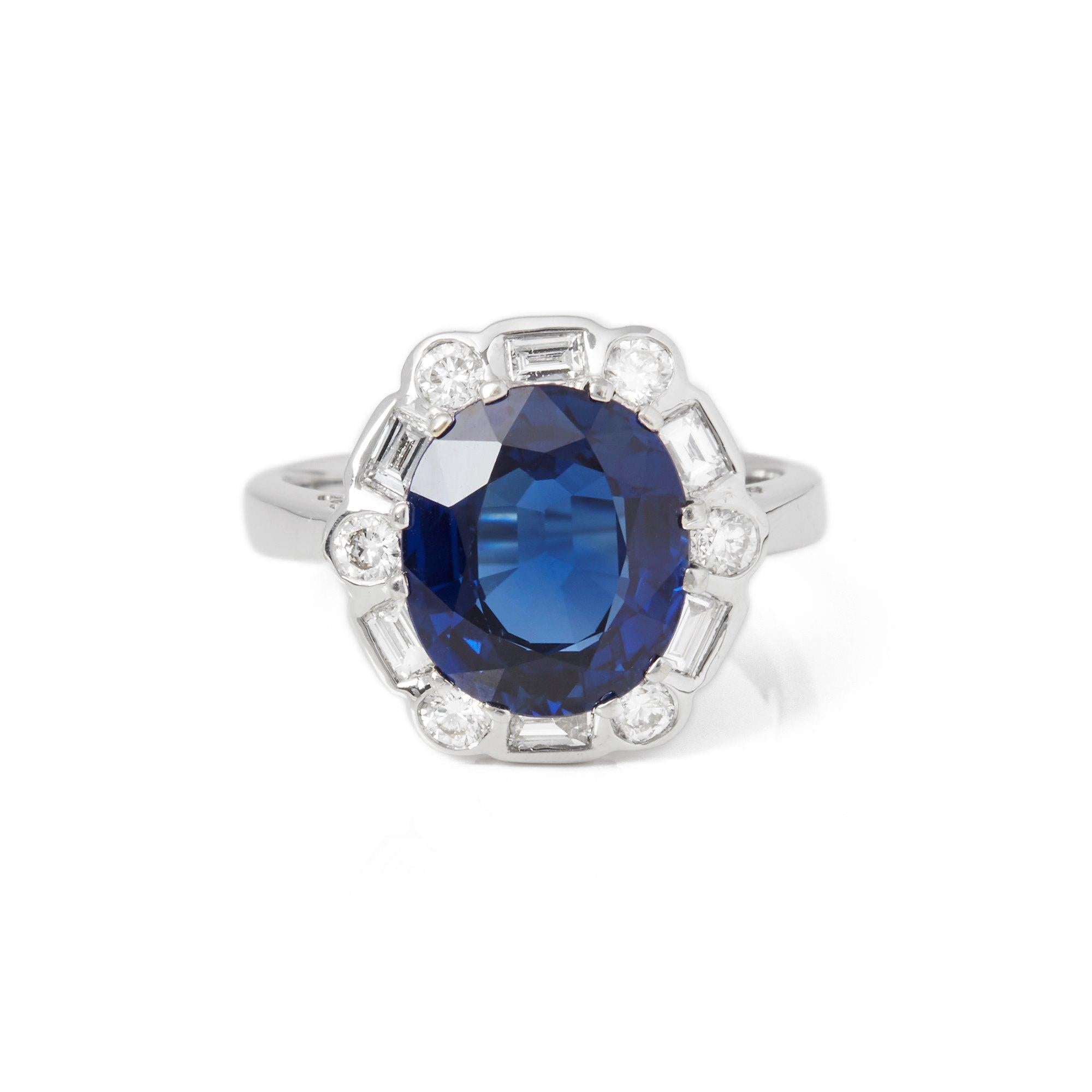 This ring designed by David Jerome is from his private collection and features one natural unheated oval cut Sapphire totalling 5.21cts sourced in Burma. Set with round brilliant cut Diamonds totalling 0.65cts mounted in an 18k white gold setting.