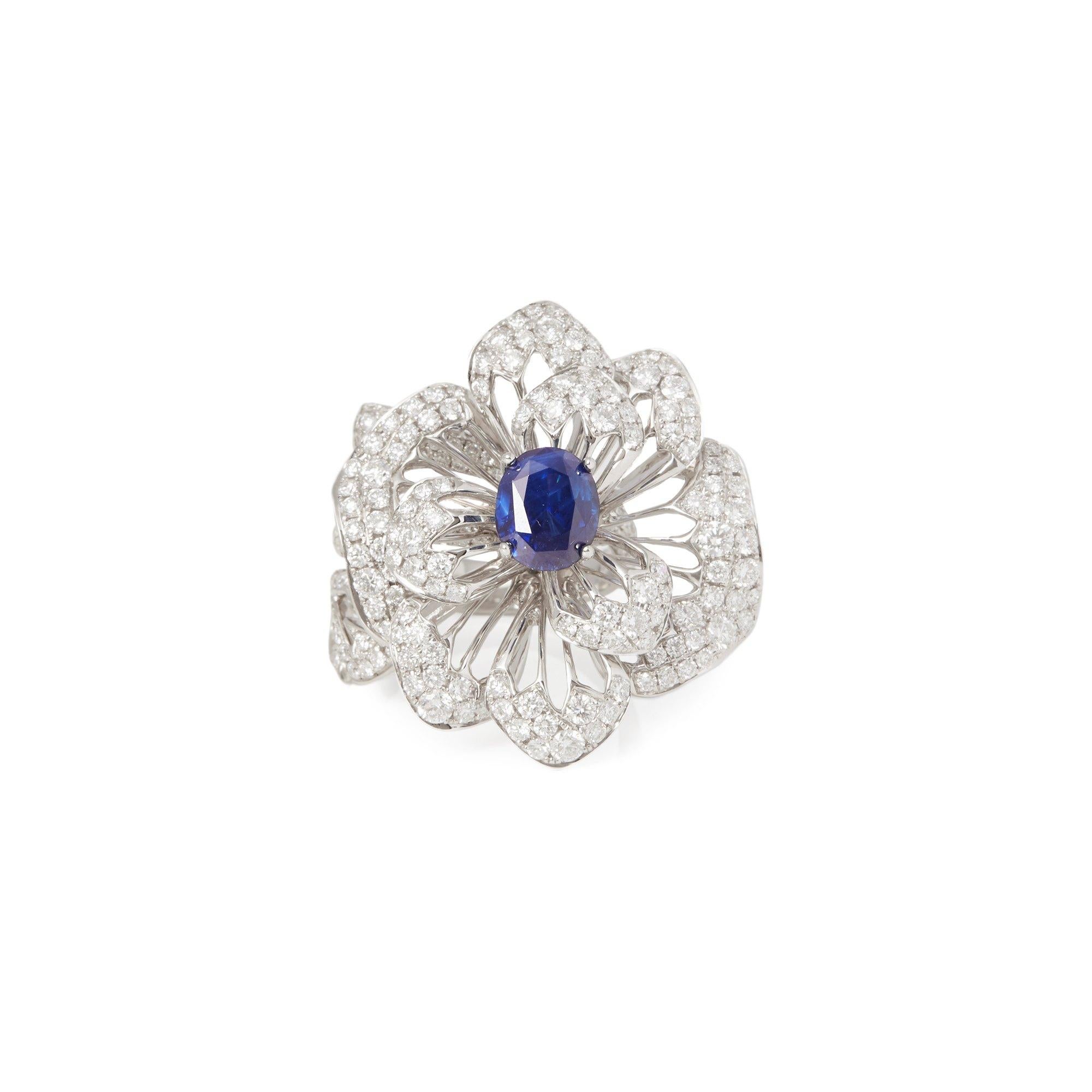 This ring designed by David Jerome is from his private collection and features one oval cut Sapphire totalling 2.84cts sourced in Sri Lanka. Set with round brilliant cut Diamonds totalling 3.35cts mounted in an 18k white gold setting. Finger size UK
