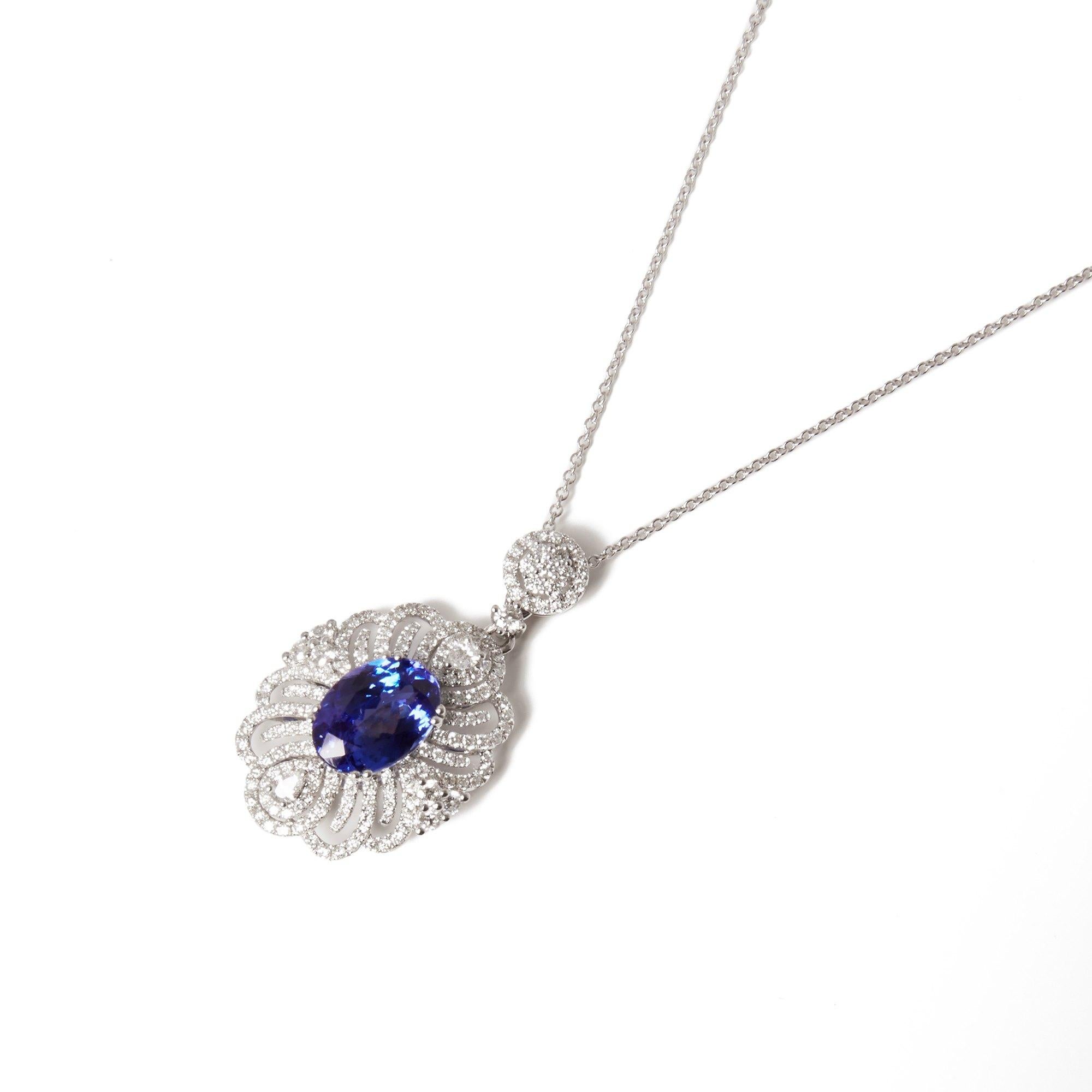 This Pendant Designed by David Jerome is from his Private Collection and features One Oval Cut Tanzanite Totalling 2.98cts Sourced in the D Block Mine Tanzania. Set with Round Brilliant Cut Diamonds Totalling 1.09cts Mounted in an 18k White Gold