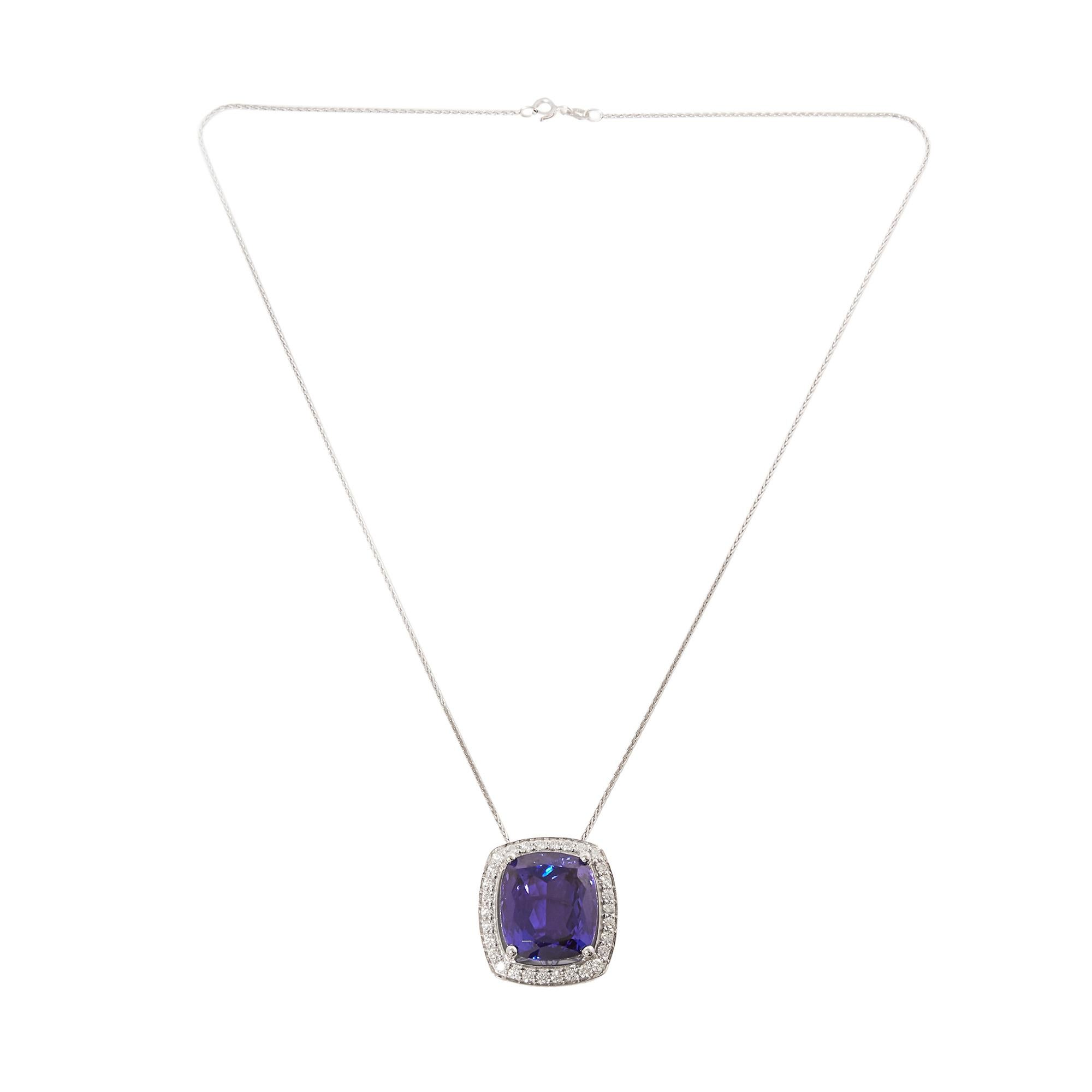 This pendant designed by David Jerome is from his private collection and features one cushion cut tanzanite totalling 25.56ct sourced in the D Block mine in Tanzania. Set with round brilliant cut diamonds totalling 1.03ct mounted in an 18k white