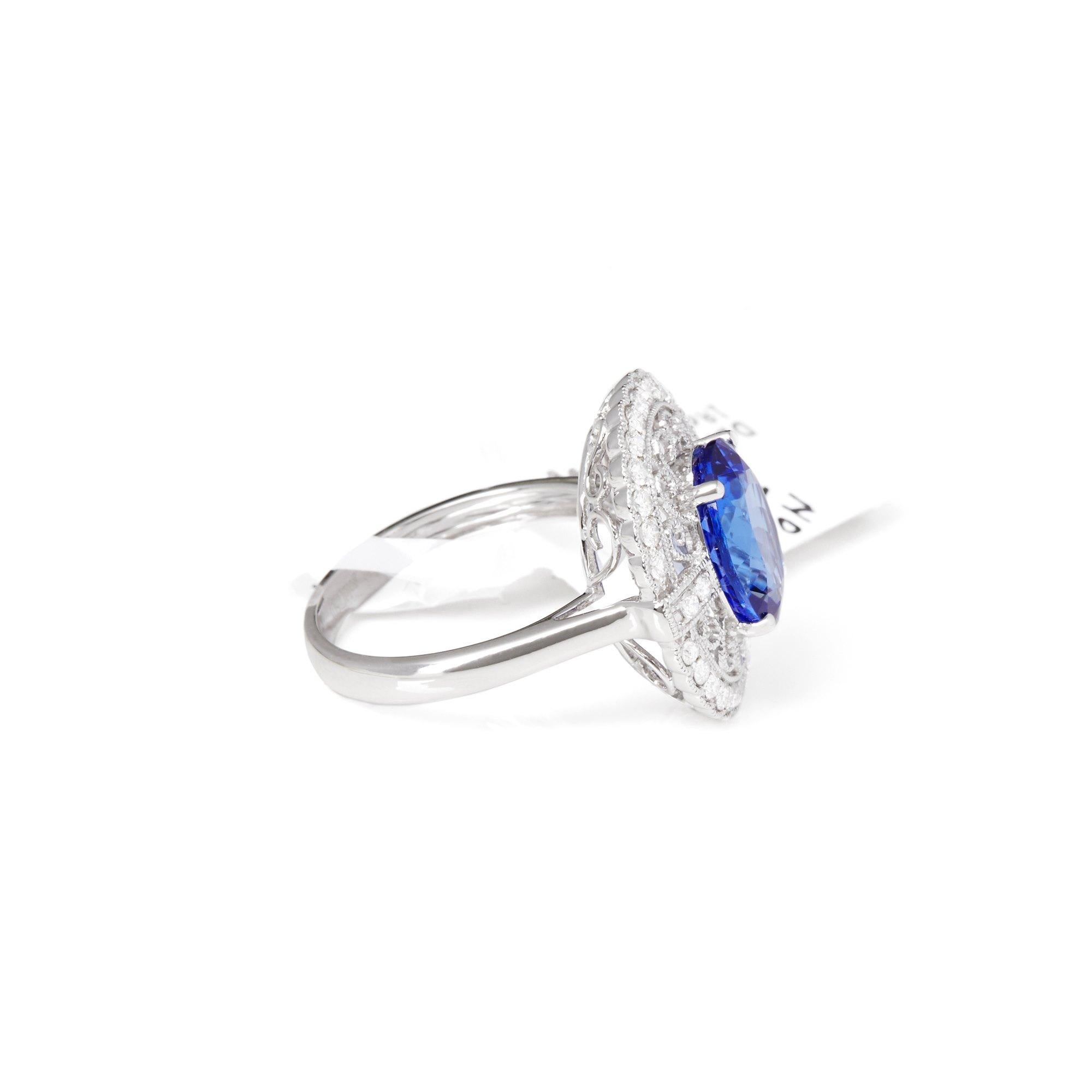 This ring designed by David Jerome is from his private collection and features one oval cut Tanzanite totalling 3.96cts sourced from the D block Mine in Tanzania. Set with round brilliant cut Diamonds totalling 0.45cts mounted in an 18k white gold