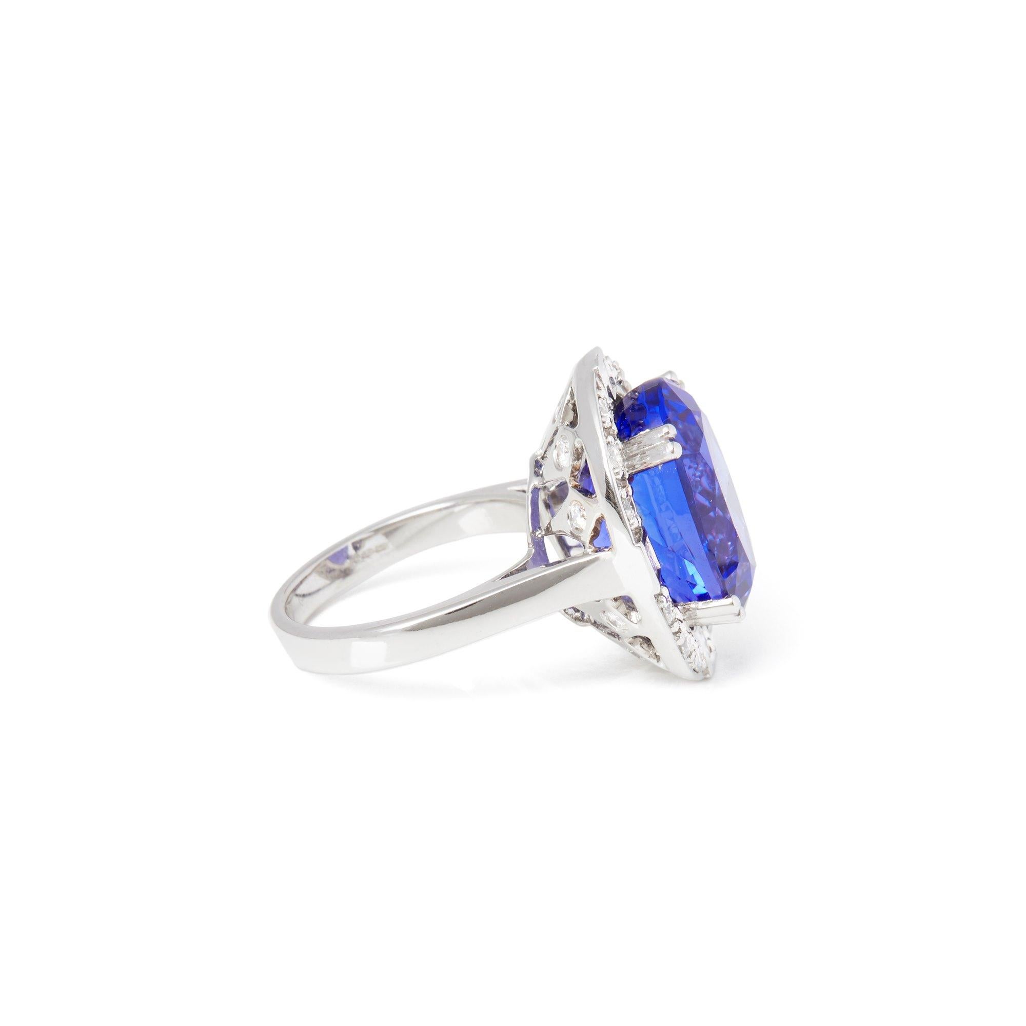 This ring designed by David Jerome is from his private collection and features one oval cut Tanzanite totalling 14.35cts sourced from the D block mine in Tanzania. Set with round brilliant cut Diamonds totalling 1.89cts mounted in an 18k white gold