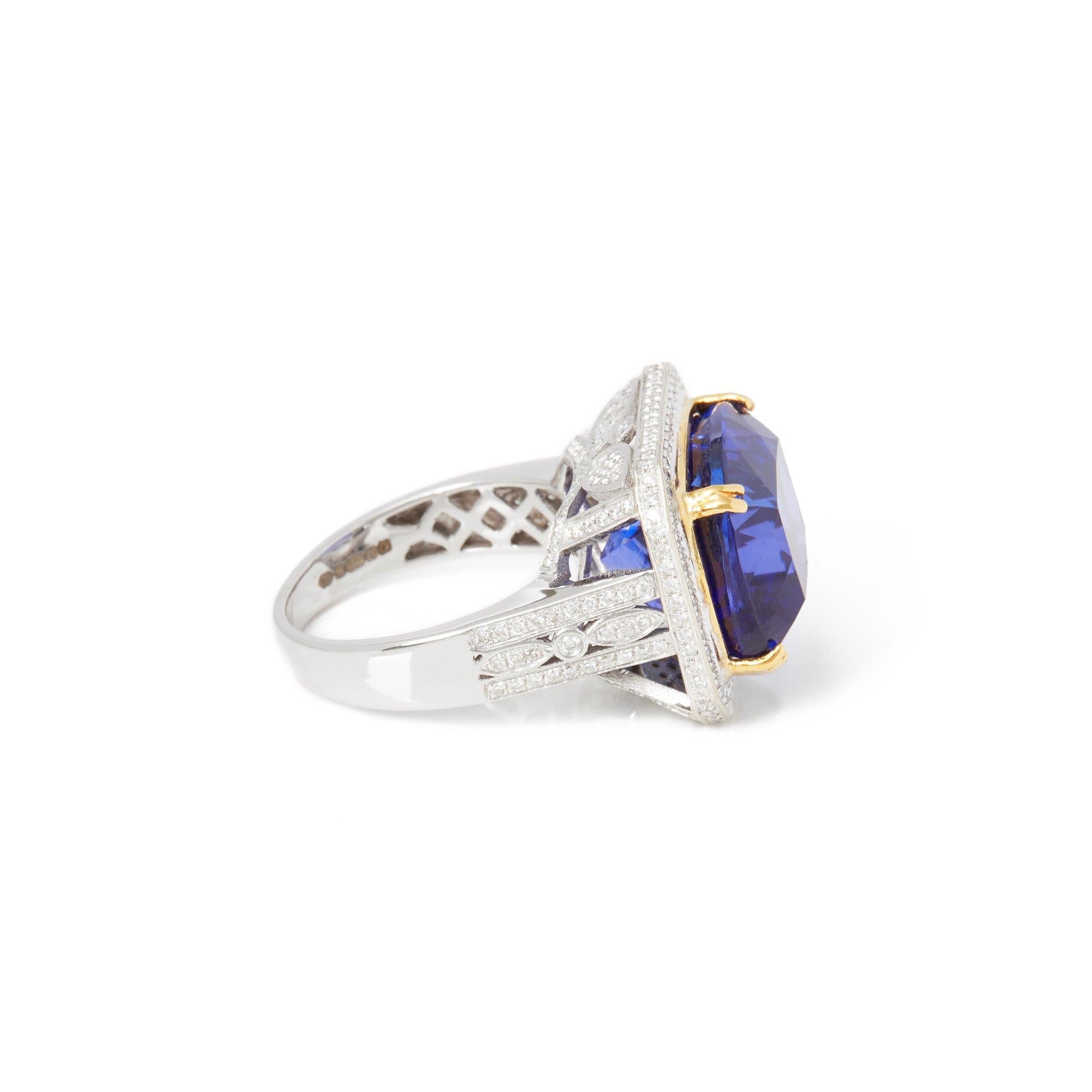 This ring designed by David Jerome is from his private collection and features one cushion cut Tanzanite totalling 15.20cts sourced in the D block mine Tanzania. Set with round brilliant cut Diamonds totalling 1.04cts mounted in an 18k white gold