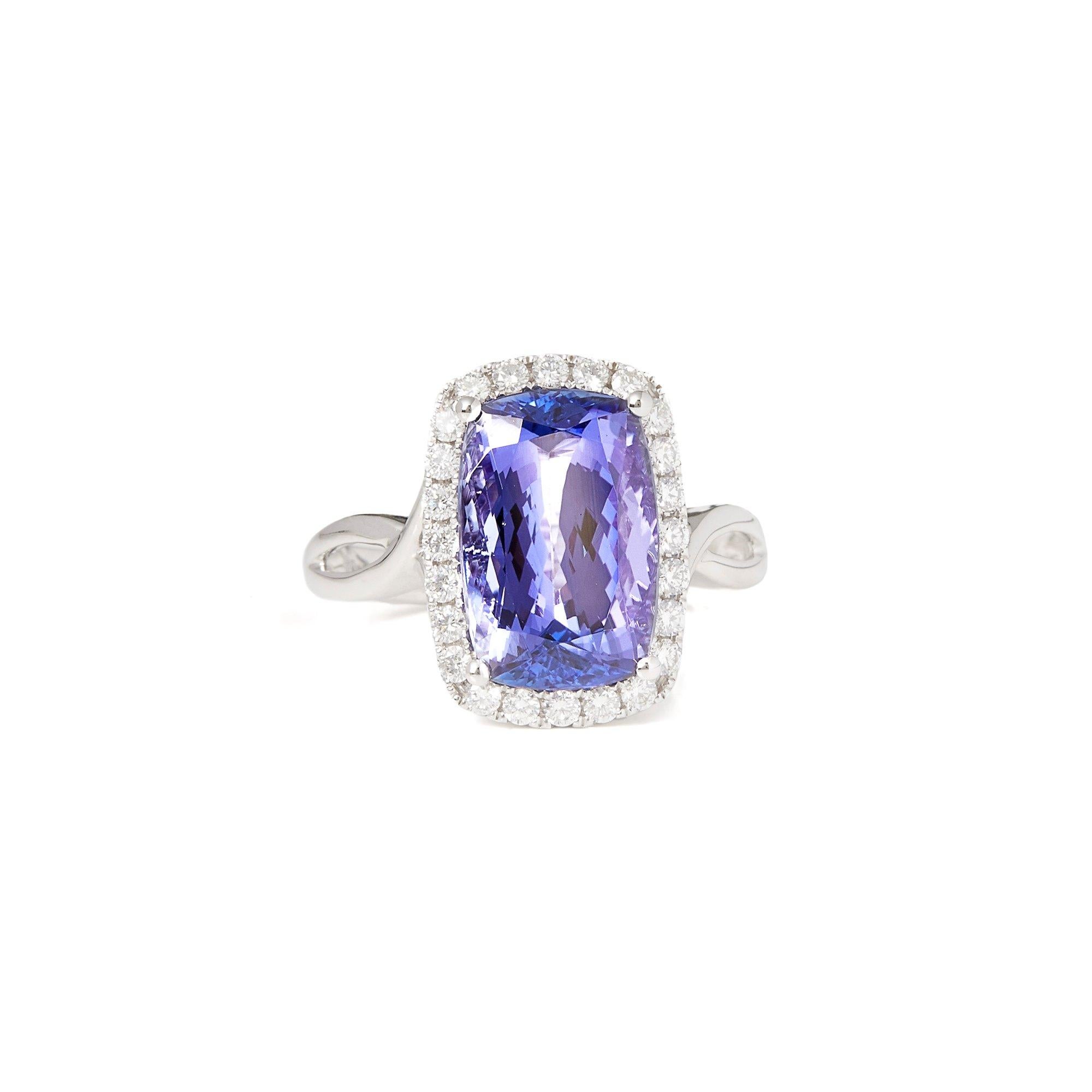 This ring designed by David Jerome is from his private collection and features one cushion cut Tanzanite totalling 5.60cts sourced in the D block mine Tanzania. Set with round brilliant cut Diamonds totalling 0.40cts mounted in an 18k white gold