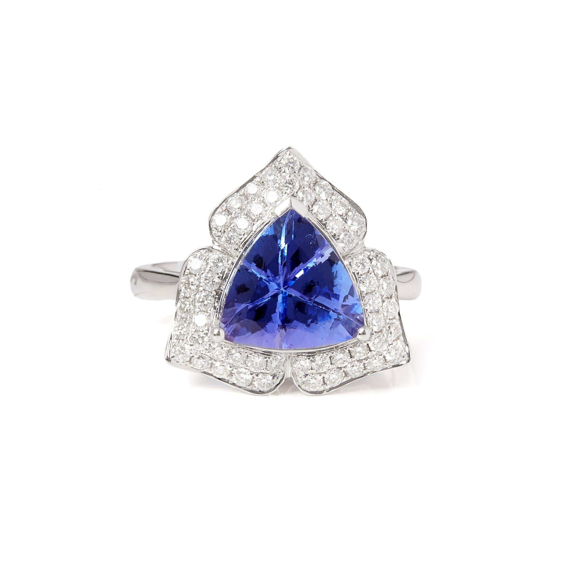This ring designed by David Jerome is from his private collection and features one trilliant cut Tanzanite totalling 3.31cts sourced in the D block mine in Tanzania. Set with round brilliant cut Diamonds totalling 0.54cts mounted in an 18k white