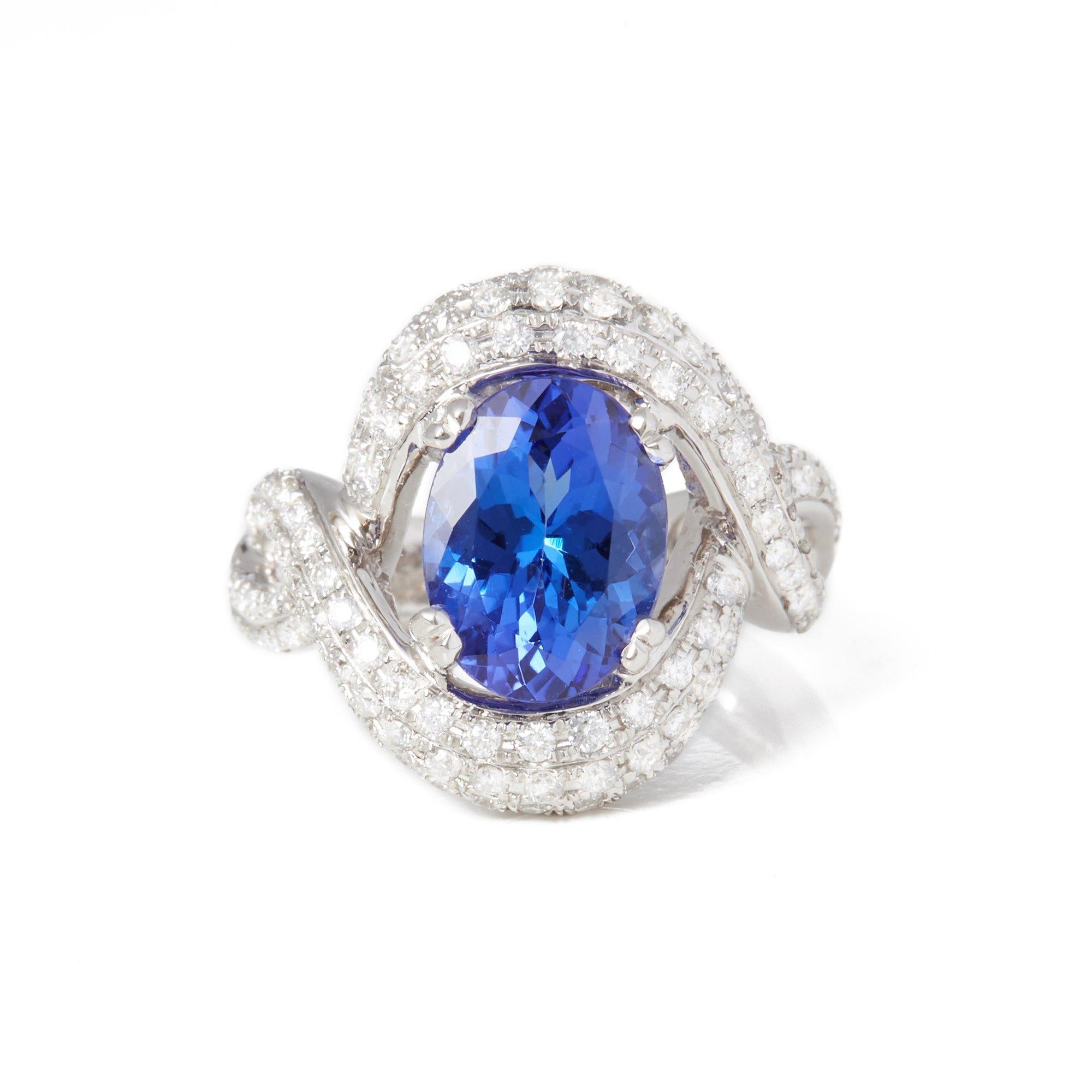 This Ring Designed by David Jerome is from his Private Collection and features One Oval Cut Tanzanite Totalling 3.44cts Sourced in the D Block Mine Tanzania. Set with Round Brilliant Cut Diamonds Totalling 1.00cts  Mounted in an 18k White Gold