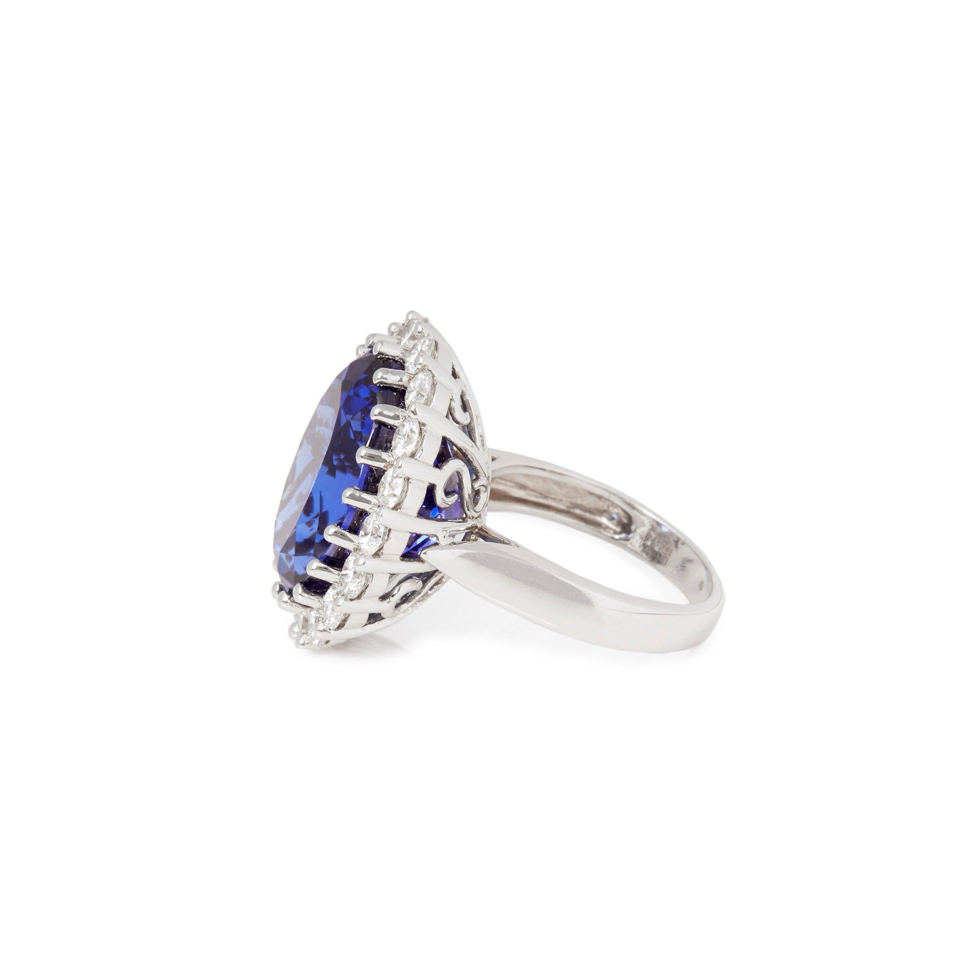 Oval Cut Certified 19.98ct Tanzanite and Diamond 18ct gold Ring For Sale