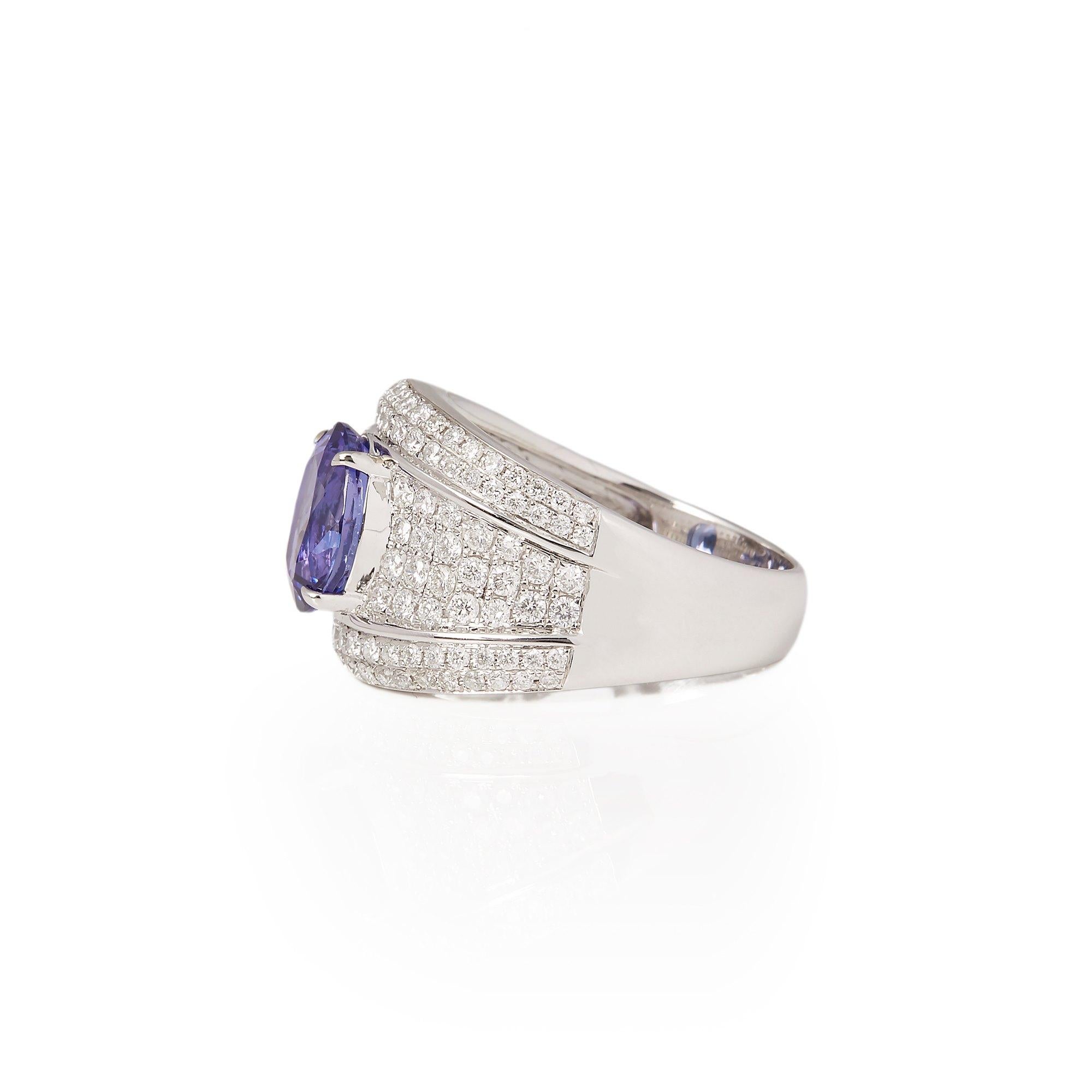 Contemporary Certified 2.87ct Oval Cut Tanzanite and Diamond 18ct gold Ring For Sale