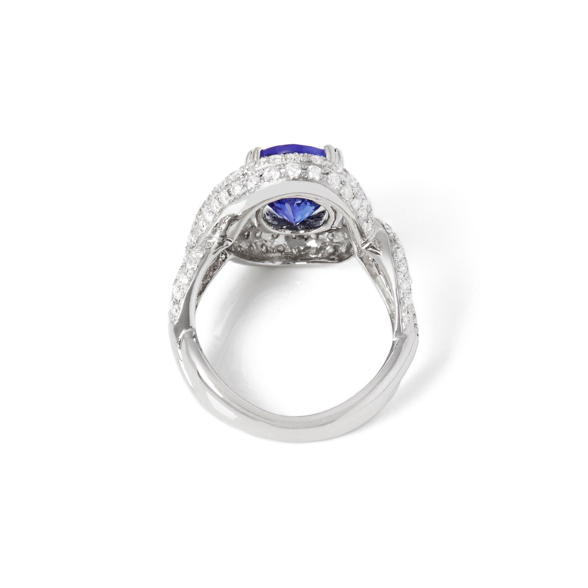 Oval Cut Certified 3.44ct Tanzanite and Diamond 18ct gold Ring For Sale