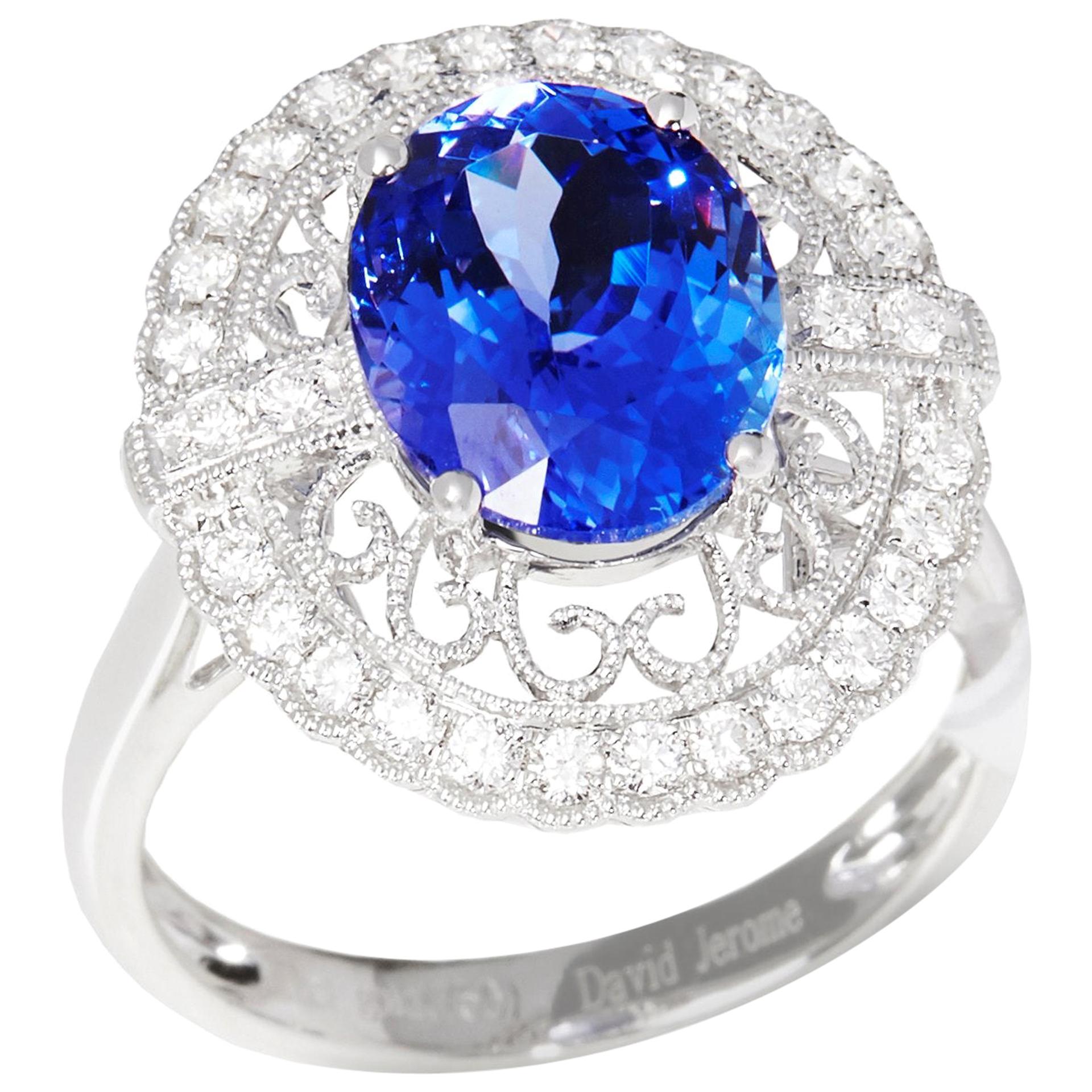 Certified 3.96ct Oval Cut Tanzanite and Diamond 18ct gold RIng For Sale