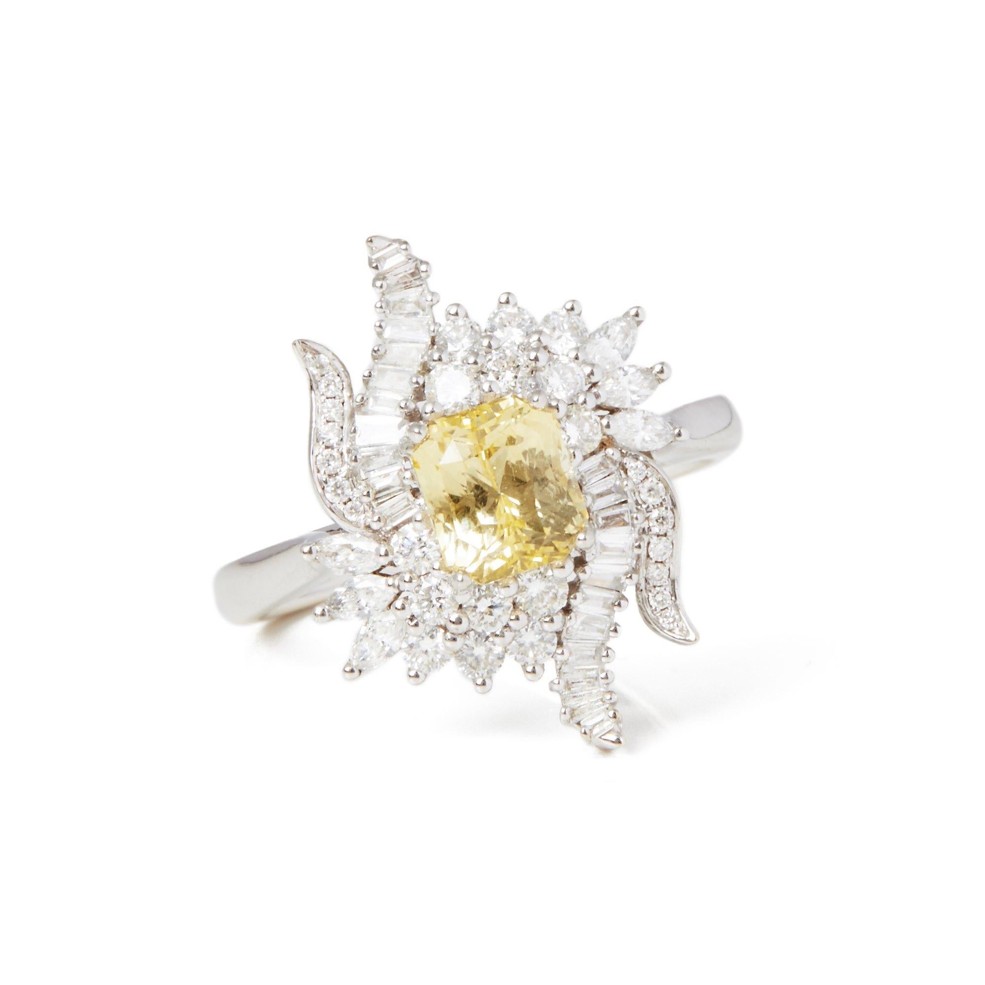This ring designed by David Jerome is from his private collection and features one natural unheated octagonal scissor cut yellow Sapphire totalling 1.57cts sourced in Sri Lanka. Set with round brilliant cut diamonds totalling 0.94cts mounted in an