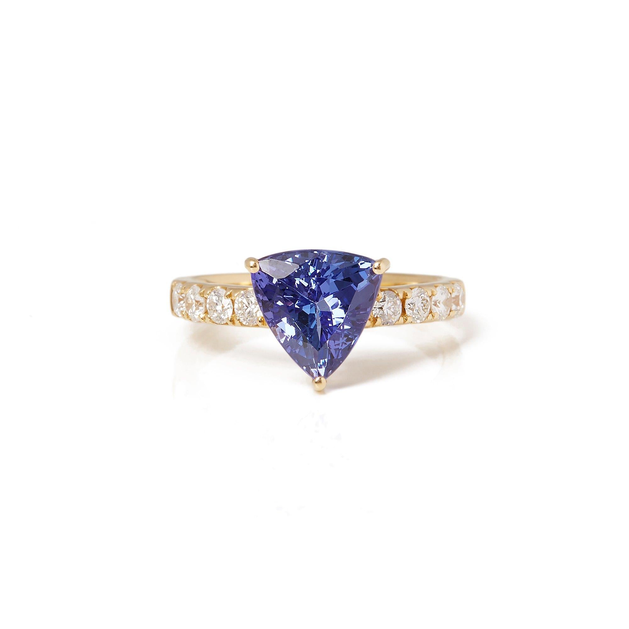 This ring designed by David Jerome is from his private collection and features one trilliant cut Tanzanite totalling 2.82cts sourced in the D block mine Tanzania. Set with round brilliant cut Diamonds totalling 0.52cts mounted in an 18k yellow gold