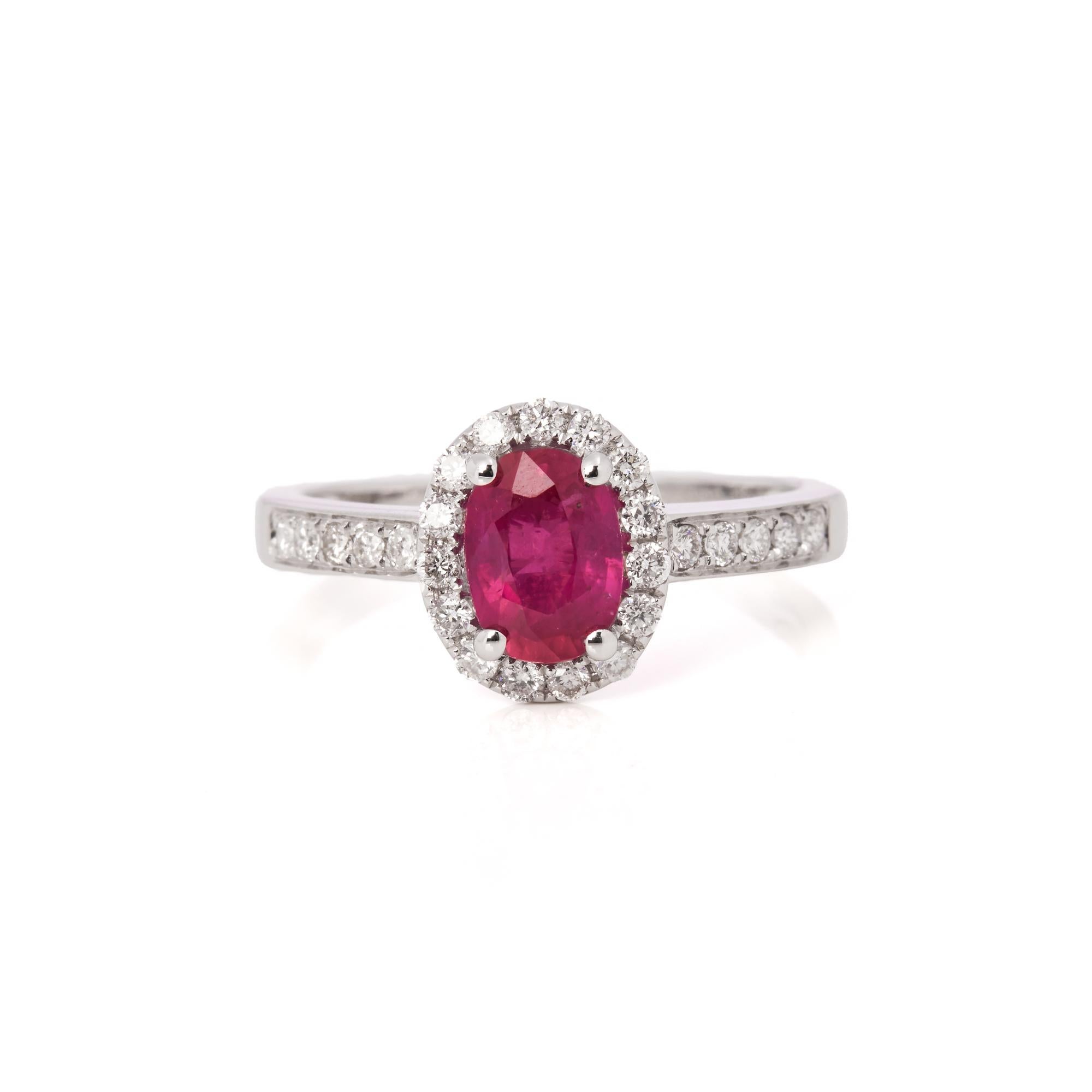 This ring is from the private collection of gemstone jewellery individually designed by David Jerome. It features an untreated oval cut ruby set with diamonds. Accompanied by an IGI gem certificate. UK ring size N. EU ring size 54. US ring size 7. 