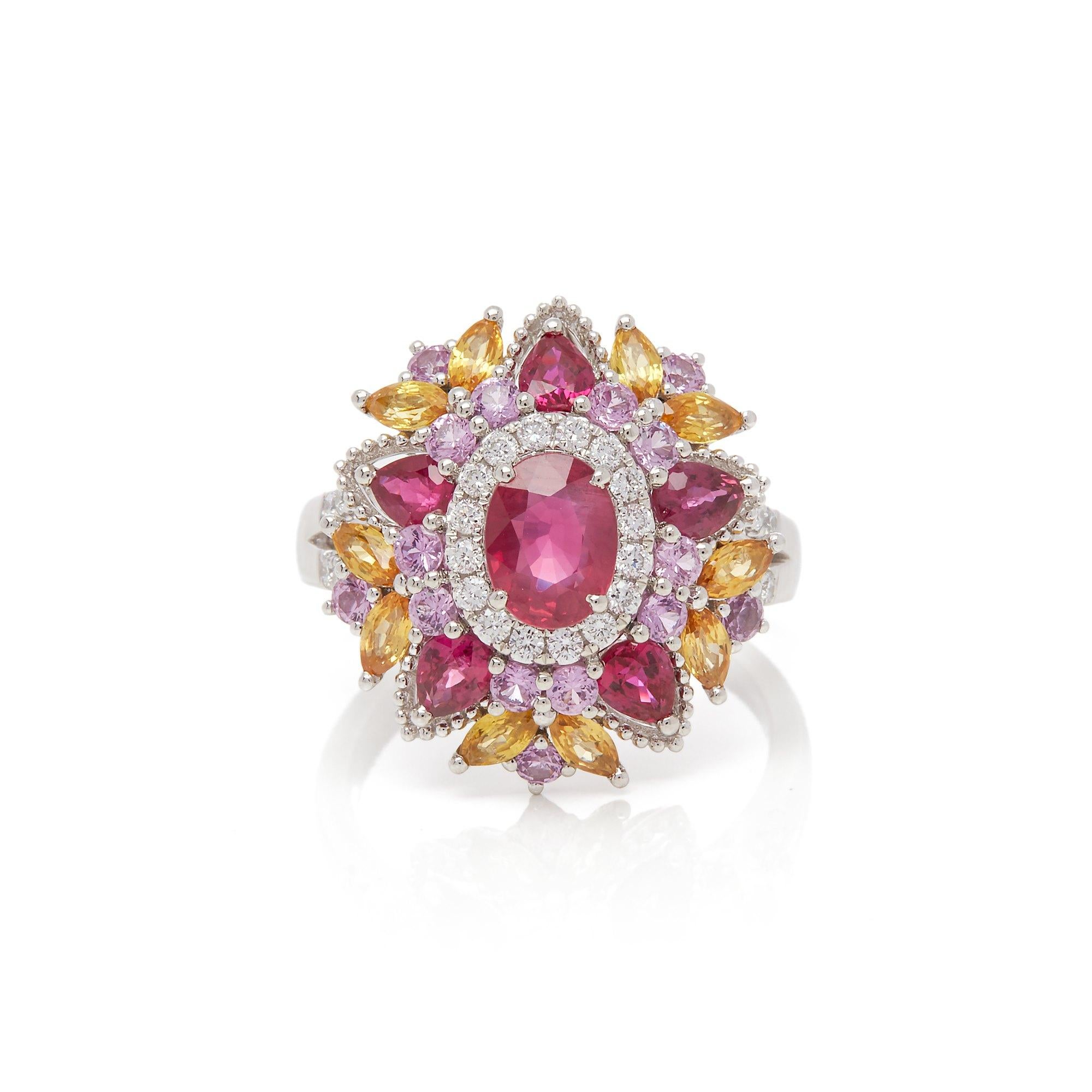 This ring designed by David Jerome is from his private collection and features one oval cut Ruby sourced in Mozambique totalling 1.17cts. Set with a mix of round brilliant cut Diamonds, Rubies, pink and yellow Sapphires totalling 2.72cts combined.