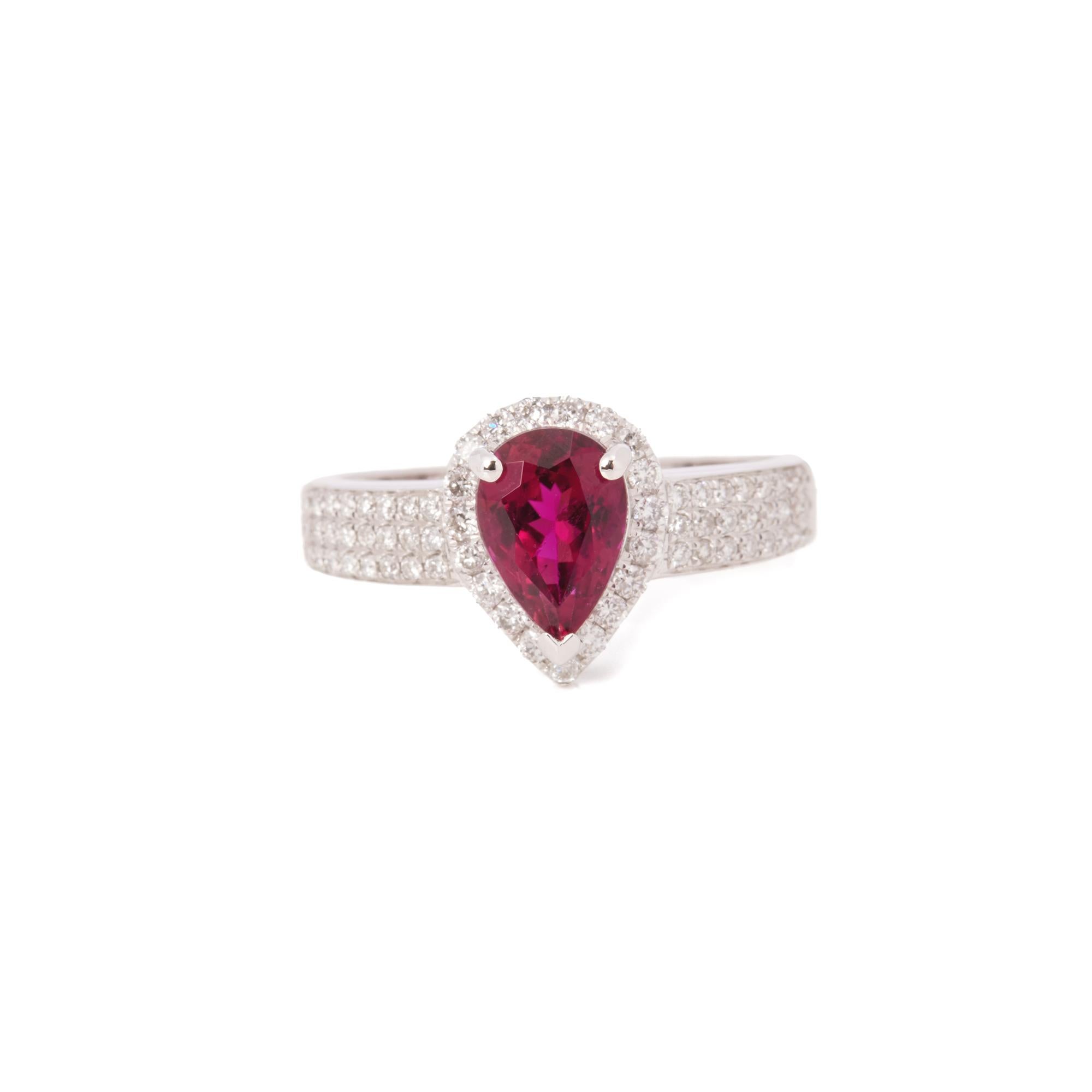 This ring is from the private collection of gemstone jewellery individually designed by David Jerome. It features a pear cut rubellite tourmaline set with diamonds. Accompanied by an IGR gem certificate. UK ring size N. EU ring size 54. US ring size