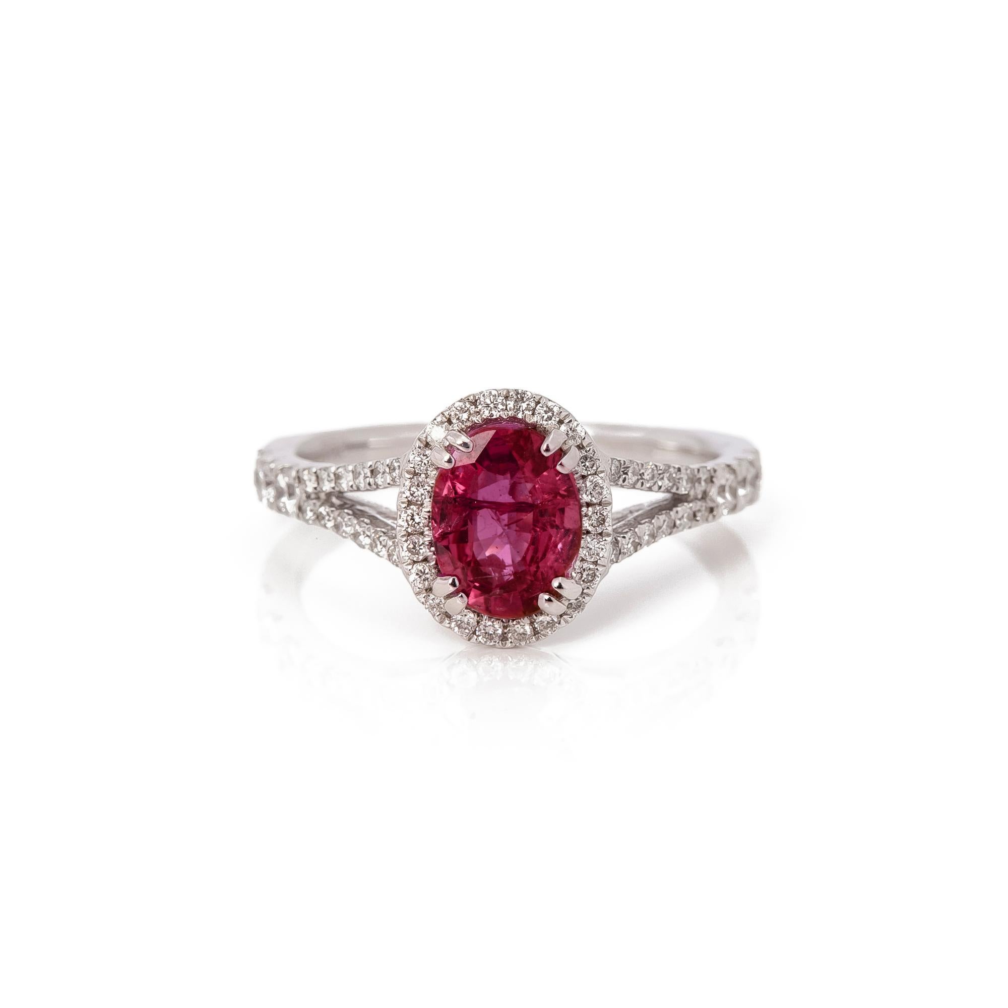This ring is from the private collection of gemstone jewellery individually designed by David Jerome. It features an untreated oval cut ruby set with diamonds. Accompanied by an IGI gem certificate. UK ring size M. EU ring size 53. US ring size 6