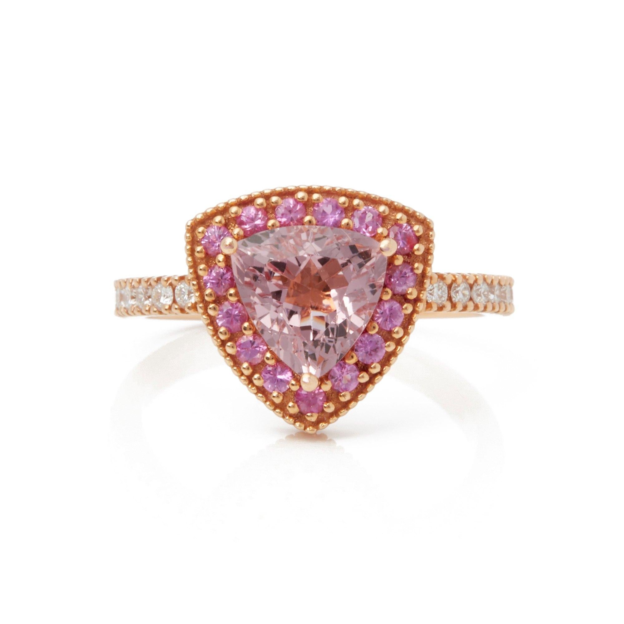 This ring designed by David Jerome is from his private collection and features one triliant cut pink Morganite sourced in Brazil. Totalling 1.49cts set with round brilliant cut Diamonds and pink Sapphires totalling 0.49cts. Mounted in an 18k rose