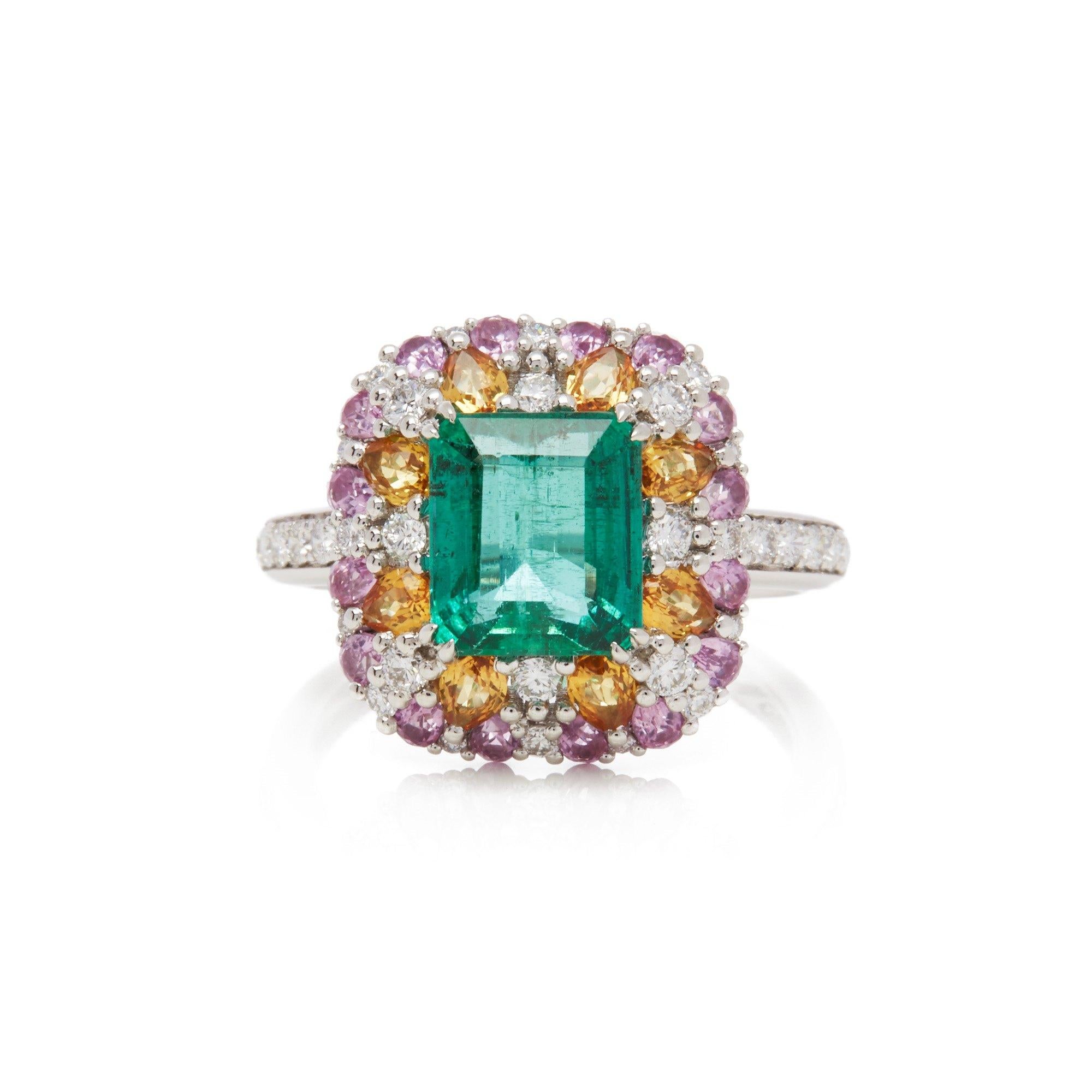 Emerald Cut Platinum Emerald, Diamond and Mixed Sapphire Cluster Ring For Sale