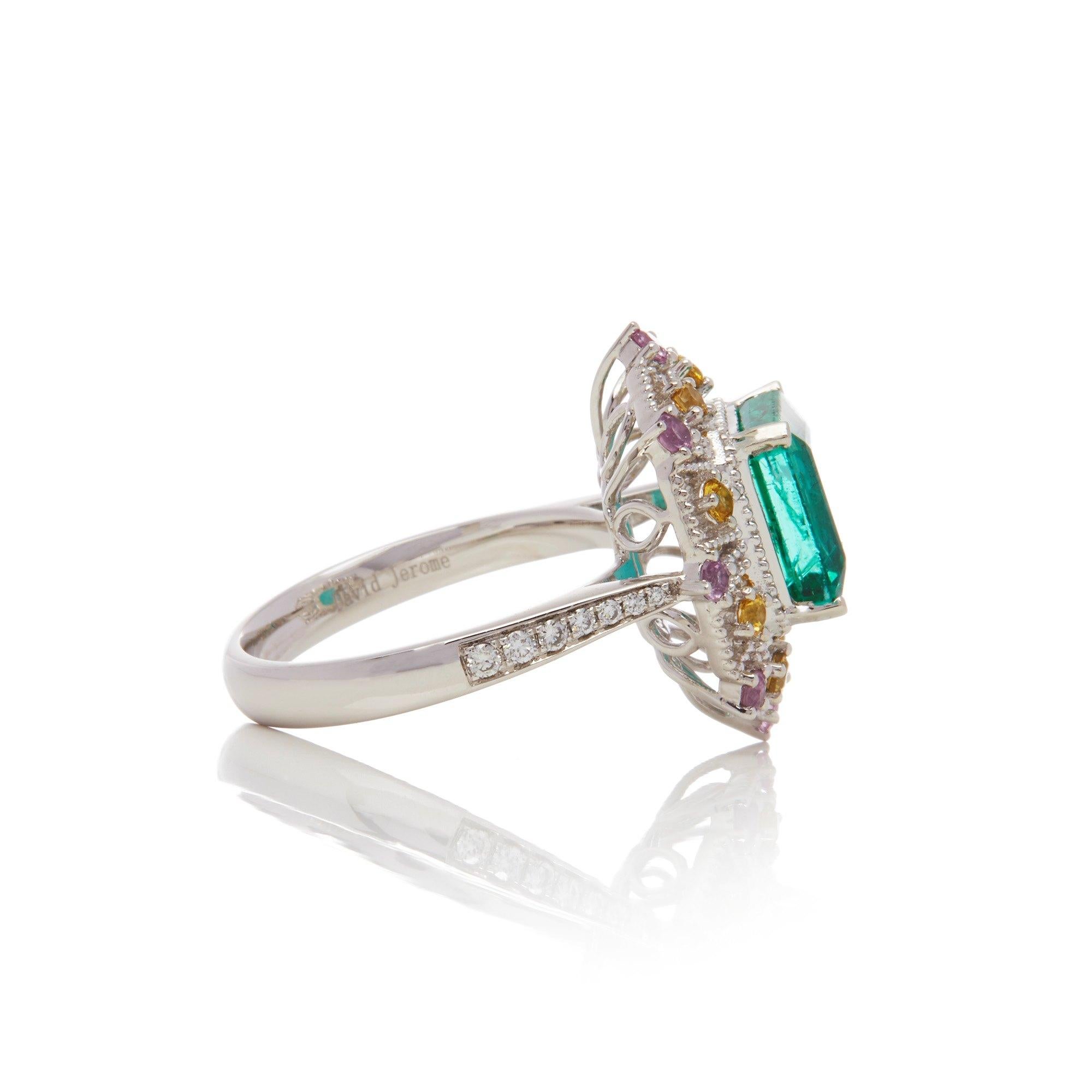 Contemporary Platinum Emerald, Diamond and Mixed Sapphire Cluster Ring For Sale