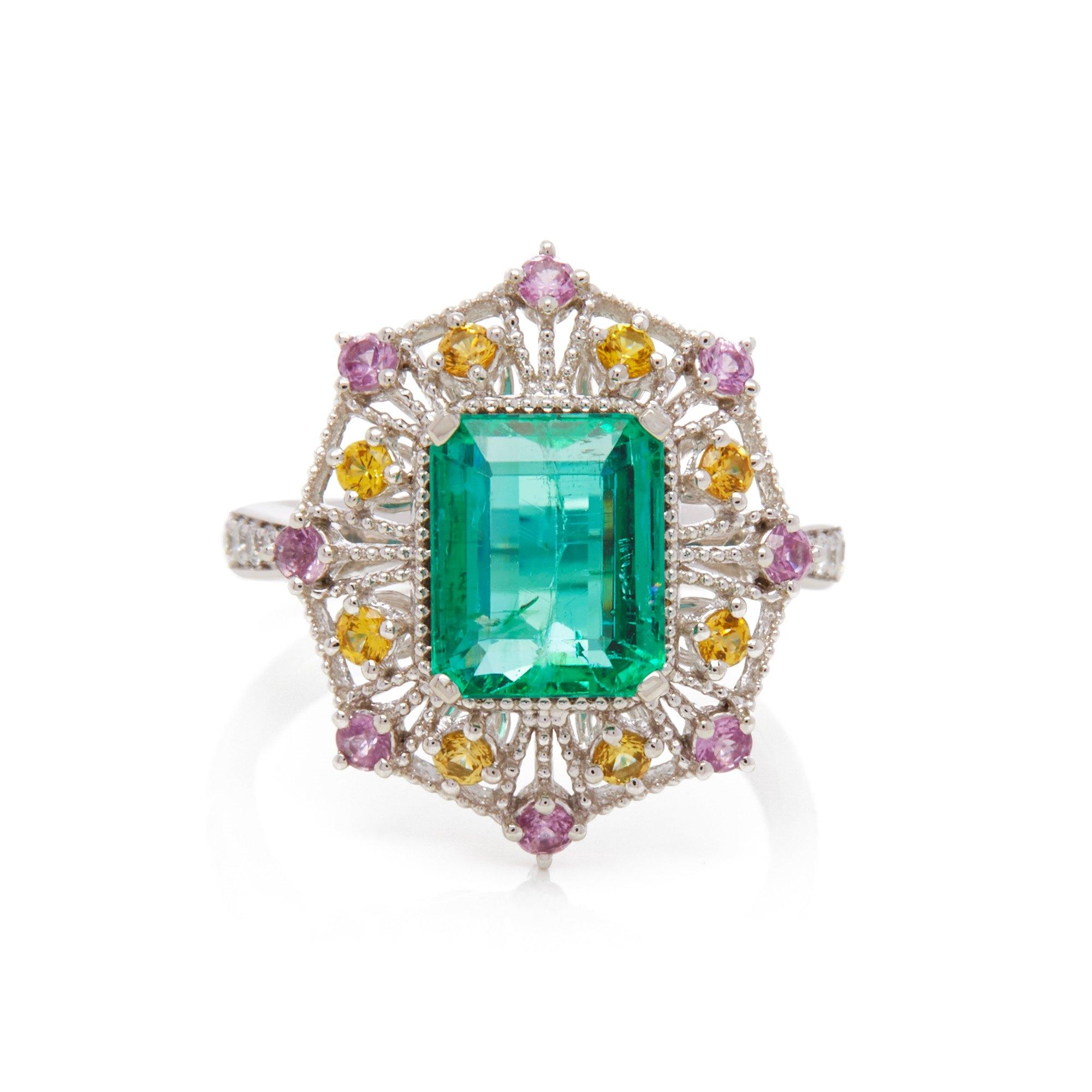 Emerald Cut Platinum Emerald, Diamond and Mixed Sapphire Cluster Ring For Sale