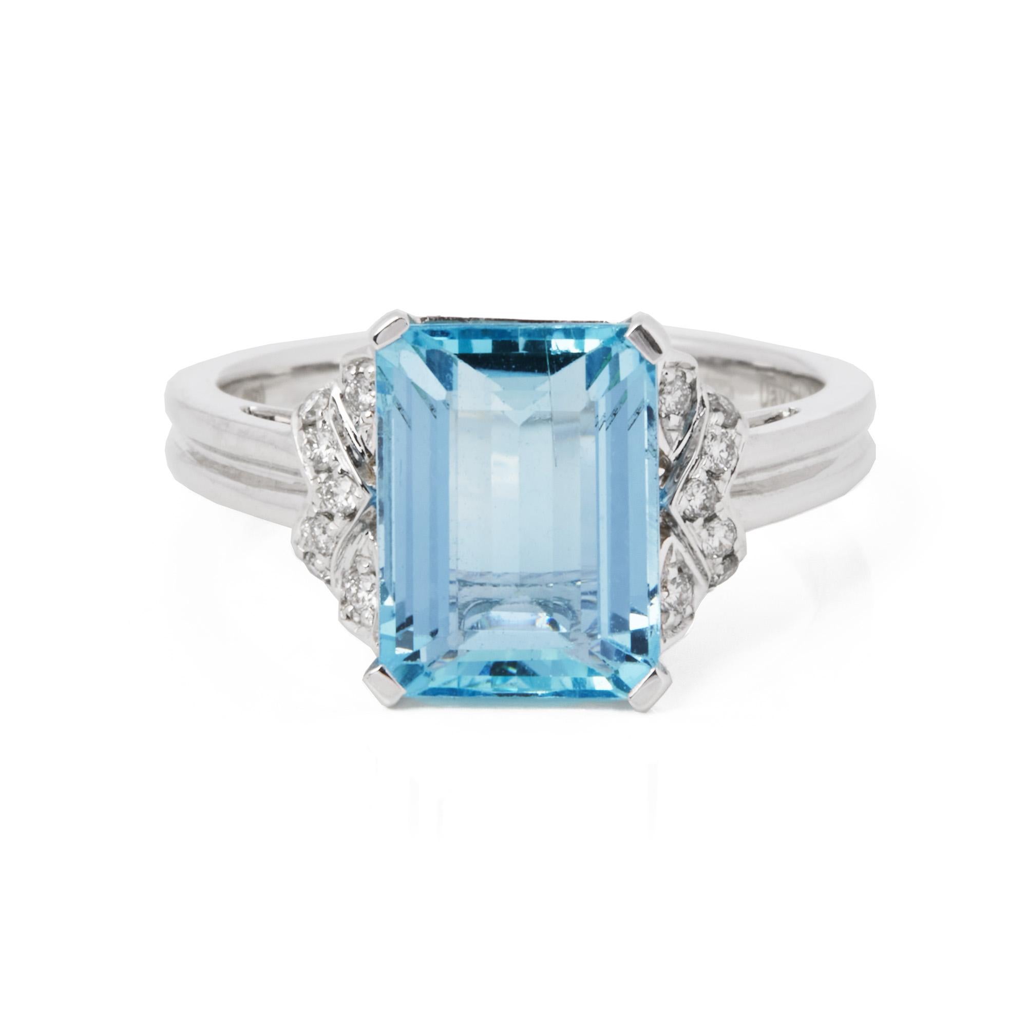 This ring is from the private collection of gemstone jewellery individually designed by David Jerome. It features an emerald cut aquamarine set with diamonds. Accompanied by a IGL gem certificate. UK ring size N. EU ring size 54. US ring size 7. 
