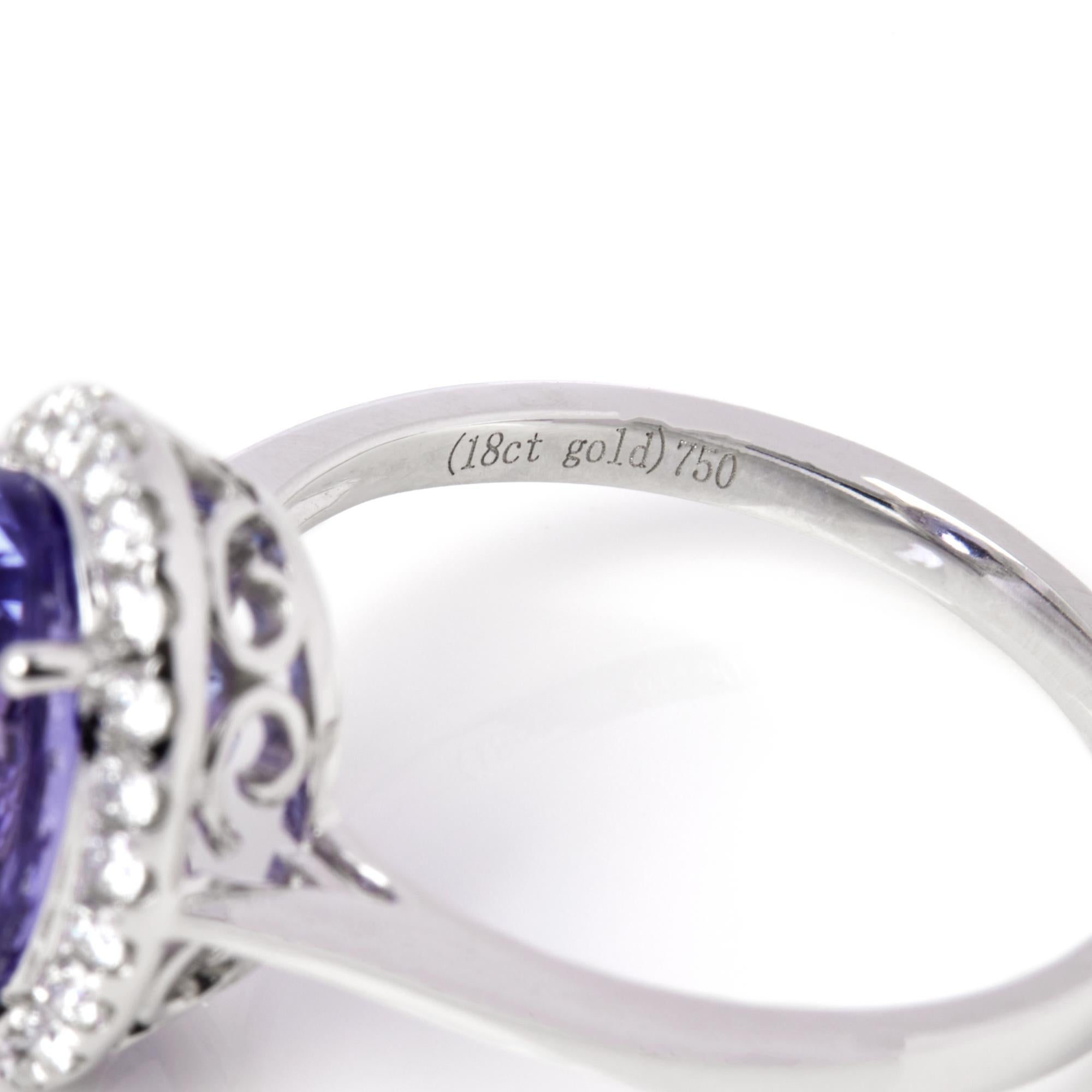 David Jerome Certified 4.23ct Oval Cut Tanzanite and Diamond Ring For Sale 2