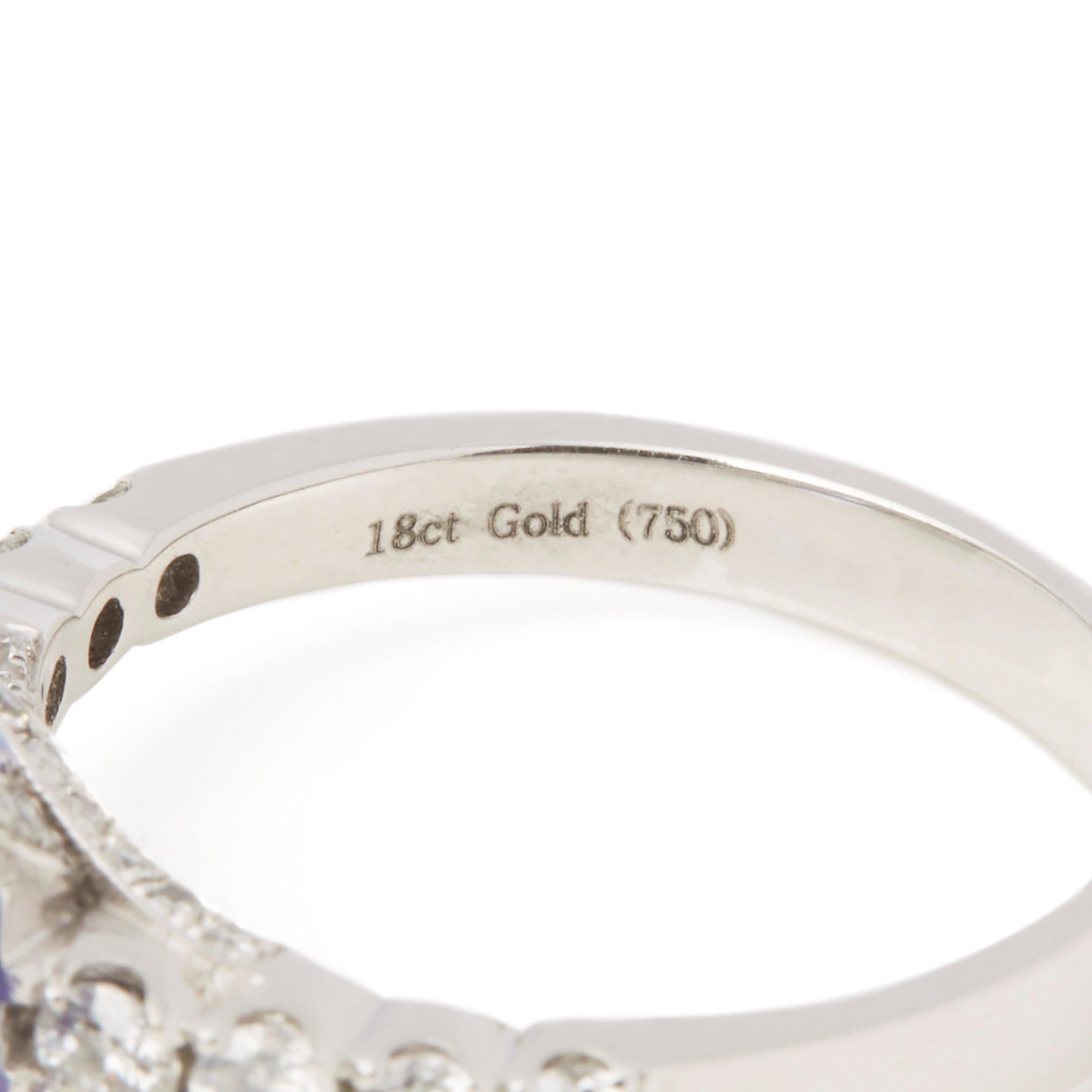 Contemporary 18ct White Gold Tanzanite and Diamond Ring For Sale