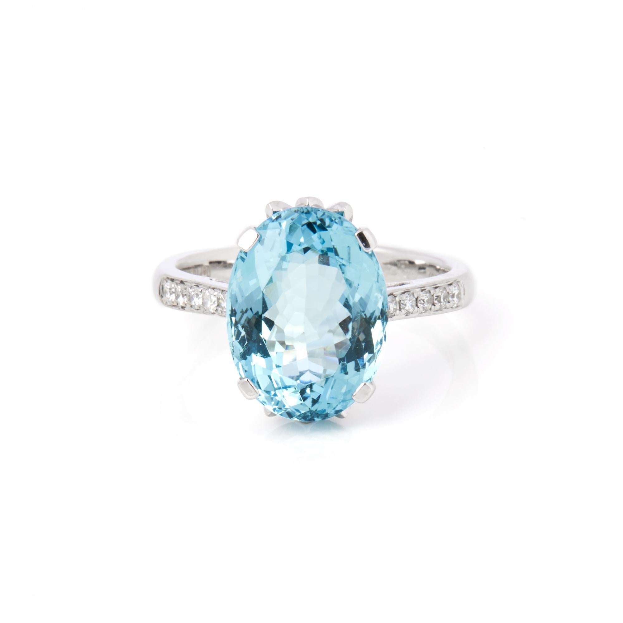 This ring is from the private collection of gemstone jewellery individually designed by David Jerome. It features an oval cut aquamarine set with diamonds. Accompanied by a WGI gem certificate. UK ring size N. EU ring size 54. US ring size 7. 