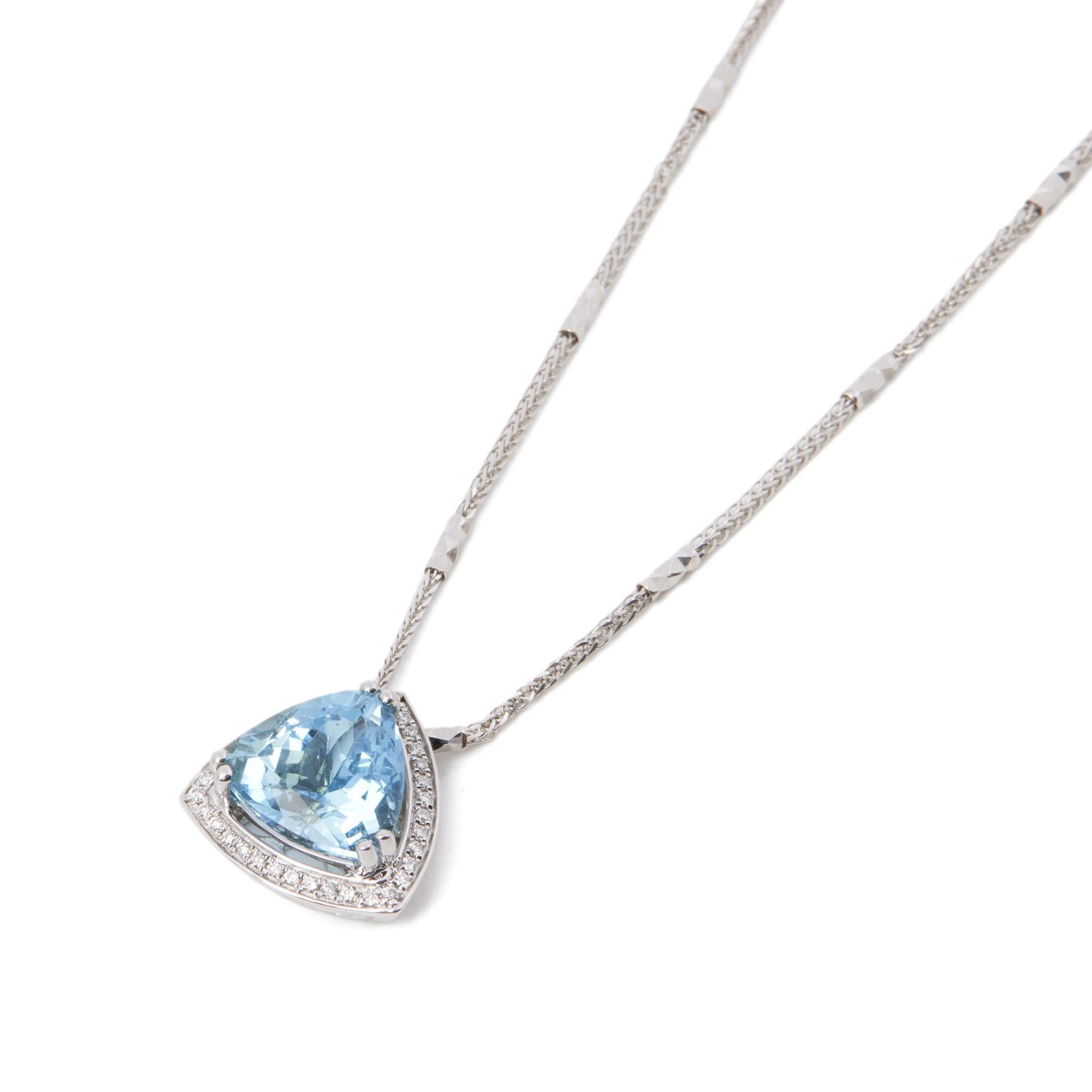 This pendant is from the private collection of gemstone jewellery individually designed by David Jerome. It features a trillion cut aquamarine set with diamonds. Accompanied by an IGR gem certificate. 
