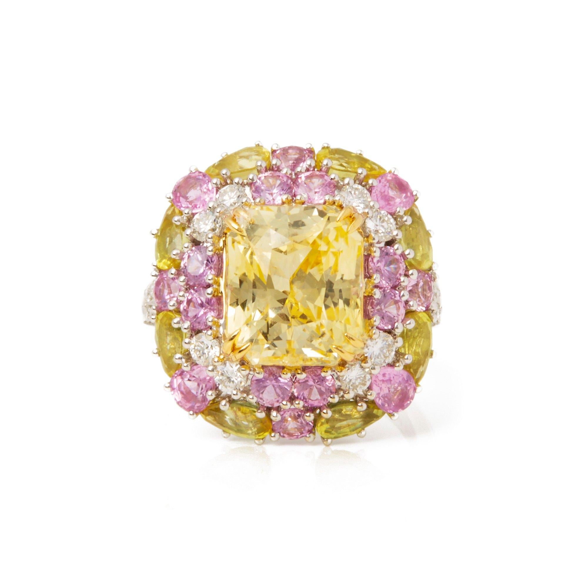 This ring designed by David Jerome is from his private collection and features one untreated octagonal scissor cut yellow Sapphire sourced in Sri Lanka. Totalling 8.14cts set with round brilliant cut Diamonds, yellow and pink Sapphires totalling