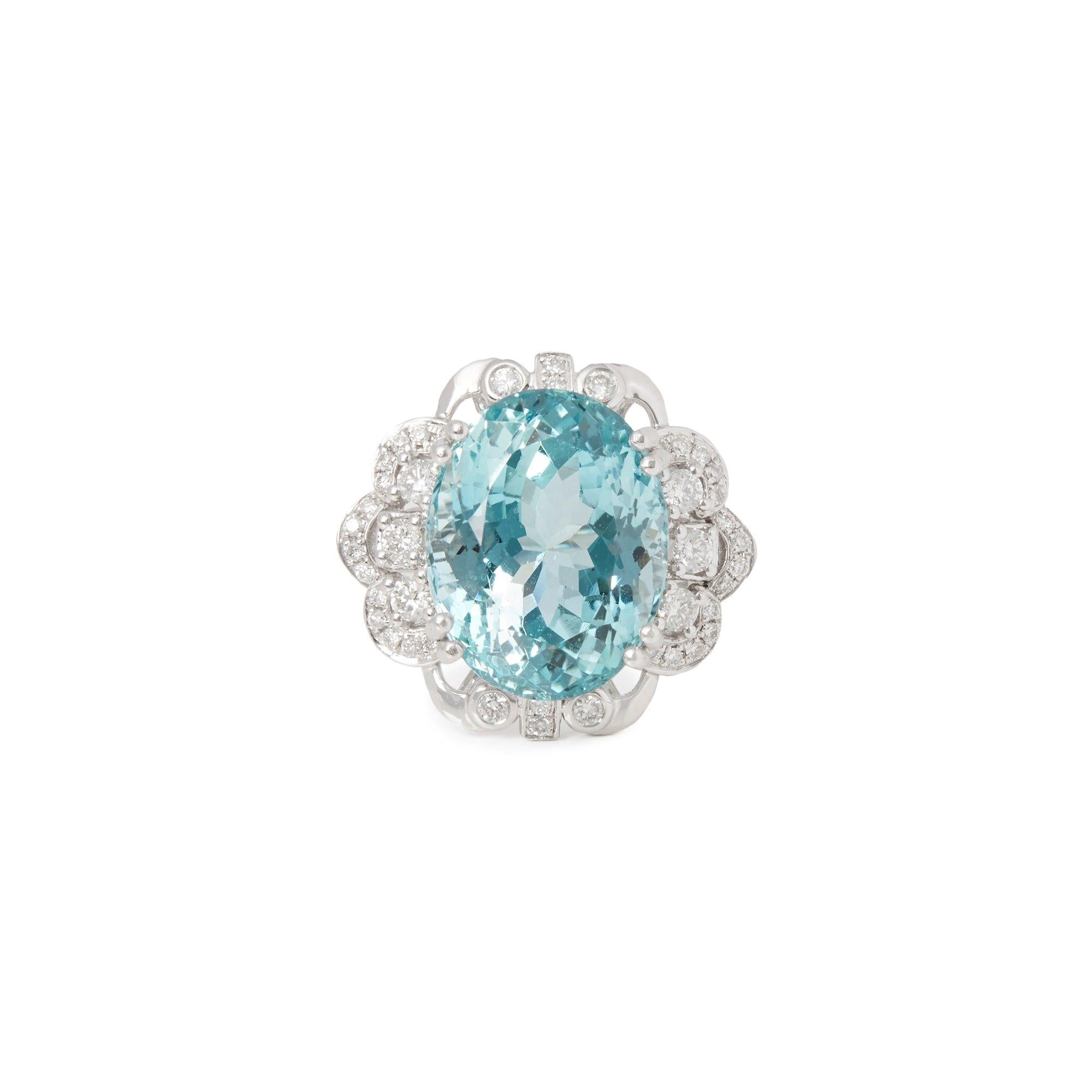 This ring designed by David Jerome is from his private collection and features one cushion cut Aquamarine totalling 12.93cts sourced in Brazil. Set with round brilliant cut Diamonds totalling 0.56cts mounted in an platinum setting. Finger size UK N,