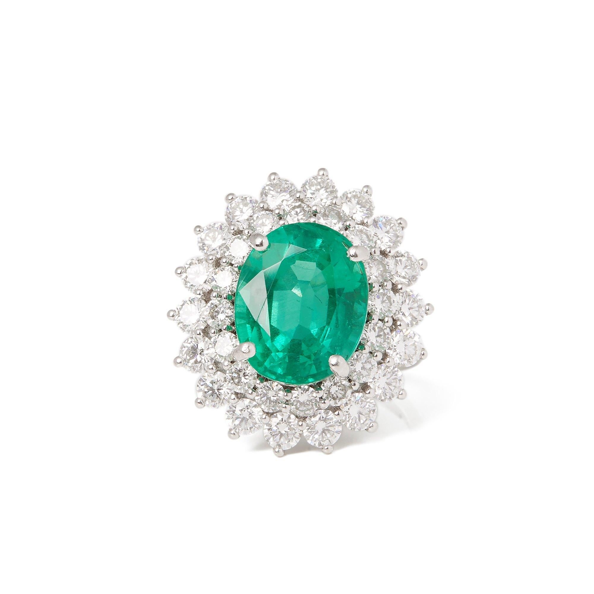 This ring designed by David Jerome is from his private collection and features one oval cut Emerald totalling 6.42cts sourced in Columbia. Set with round brilliant cut Diamonds totalling 3.04cts mounted in a platinum setting. Finger size UK N, EU