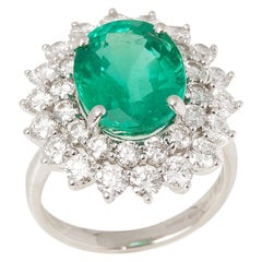 Certified 6.42ct Untreated Oval cut Colombian Emerald and Diamond Platinum Ring