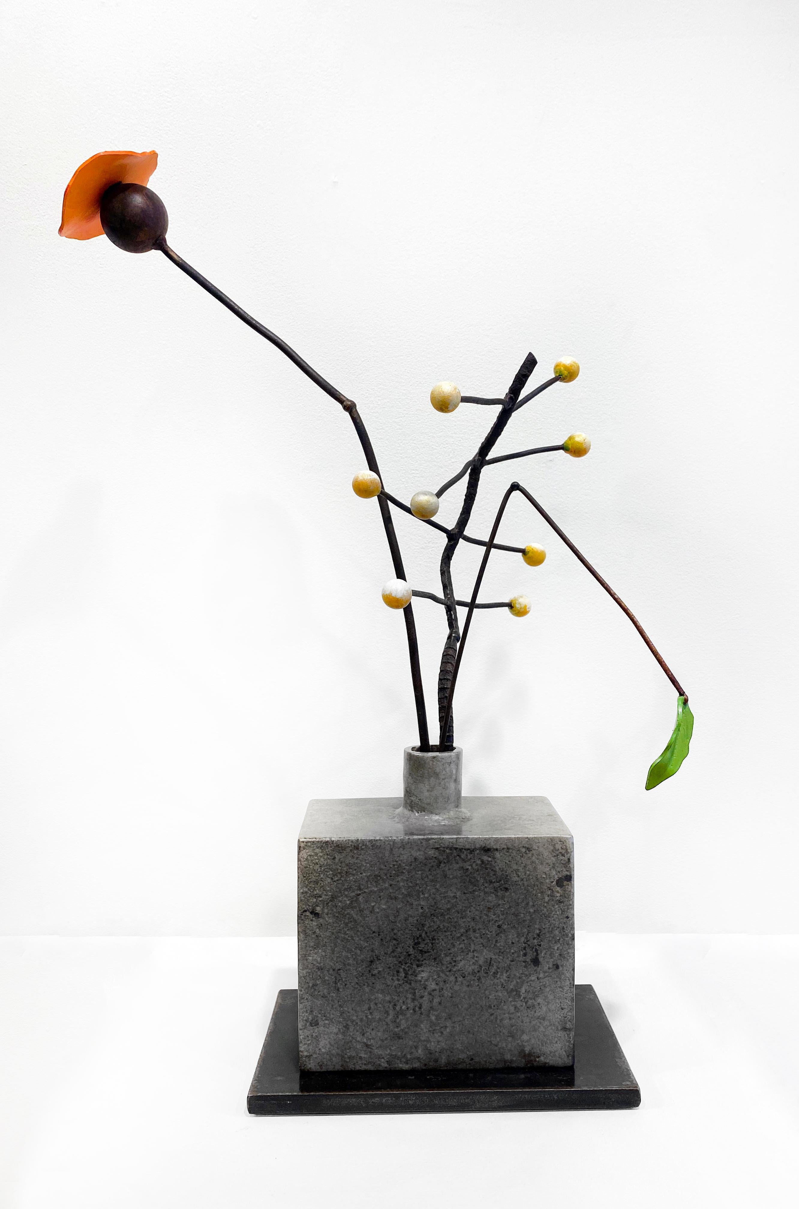 'Poppy, Seeds' by David Kimball Anderson, 2021. Bronze, steel, and paint, 26 x 20 x 8 in. This sculpture features a square vase cast in bronze and finished with a grey patina. It features a series of white bulbs extending from bronze branches, a